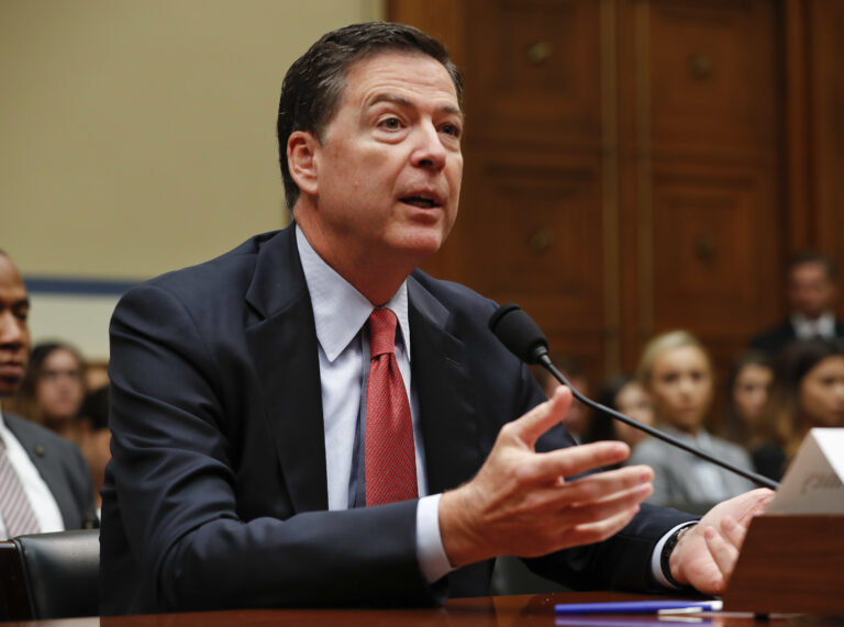 FILE - In this Sept. 28, 2016 file photo, FBI Director James Comey testifies on Capitol Hill in Washington. A Homeland Security Department official says hackers have targeted the voter registration systems of more than 20 states in recent months. Comey told lawmakers this week that the agency is looking “very, very hard” at Russian hackers who may try to disrupt the U.S. election.  (AP Photo/Pablo Martinez Monsivais, File) (AP)