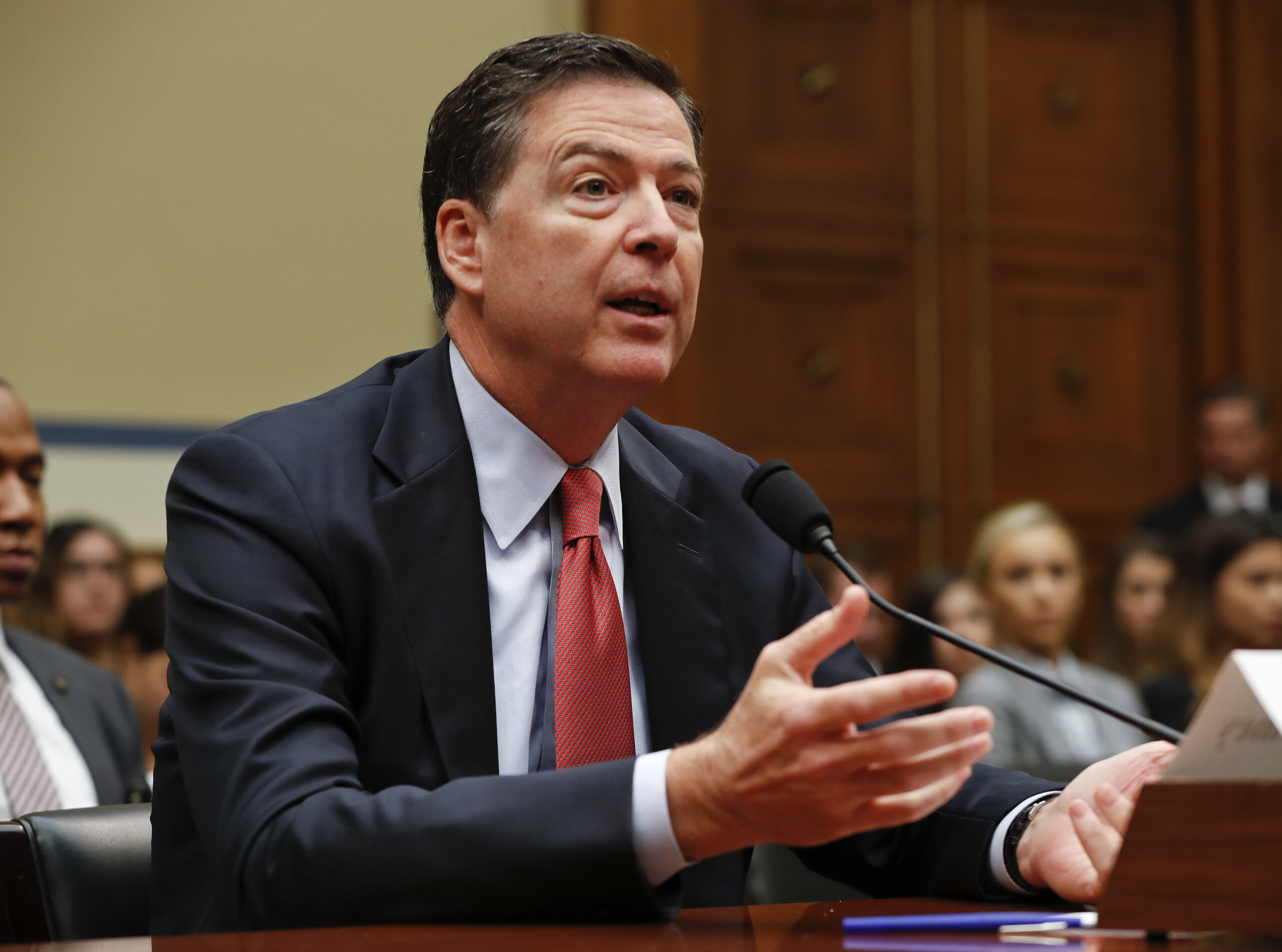 FILE - In this Sept. 28, 2016 file photo, FBI Director James Comey testifies on Capitol Hill in Washington. A Homeland Security Department official says hackers have targeted the voter registration systems of more than 20 states in recent months. Comey told lawmakers this week that the agency is looking “very, very hard” at Russian hackers who may try to disrupt the U.S. election.  (AP Photo/Pablo Martinez Monsivais, File) (AP)