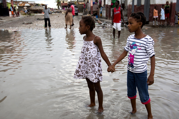 Flooded street after the passing of Hurricane Matthew in Les Cayes, Haiti (AP/Dieu Nalio Chery)