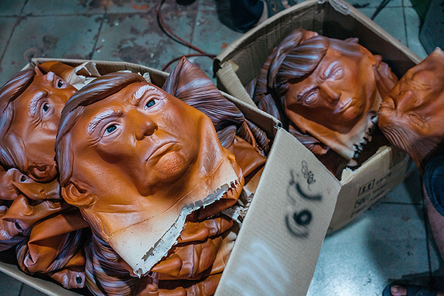 Masks of Donald Trump are seen in boxes at the Shenzhen Lanbingcai Latex Crafts Factory on October 18, 2016 in Shenzhen, China. (Getty Images)