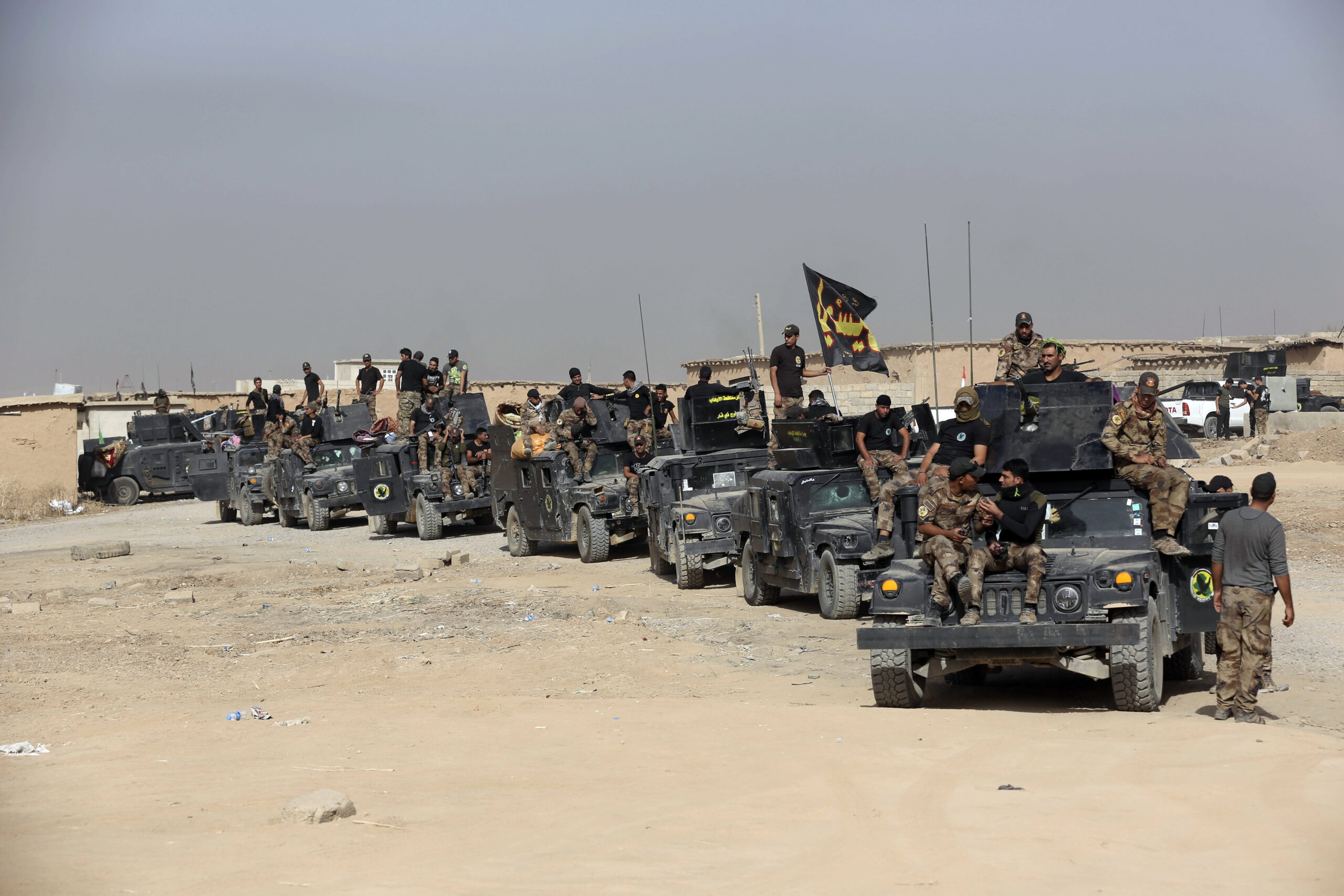 File - In this Saturday, Oct. 15, 2016 file photo, Iraq's elite counterterrorism forces gather ahead of an operation to re-take the Islamic State-held City of Mosul, outside Irbil, Iraq. Iraqi Prime Minister Haider al-Abadi announced the start of military operations to liberate the northern city of Mosul from Islamic State militants on Monday, launching the country on its toughest battle since American troops left nearly five years ago. (AP Photo/Khalid Mohammed, File) (AP)