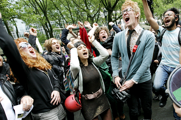 Occupy Wall Street demonstrators dance as hundreds of protesters gather during a May Day labor rally (Getty/Monika Graff)