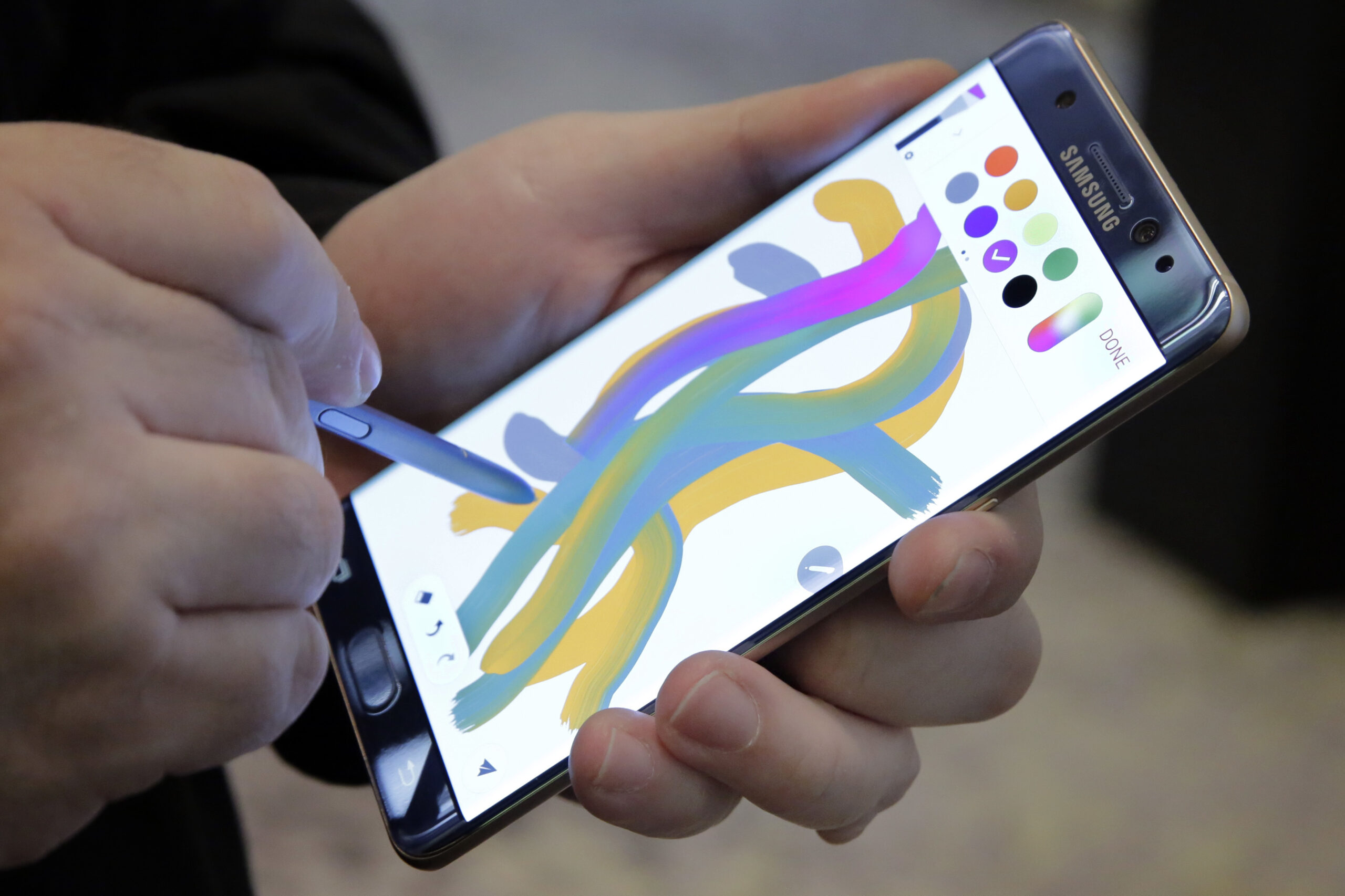n this July 28, 2016, file photo, a color blending feature of the Galaxy Note 7 is demonstrated in New York. (AP)