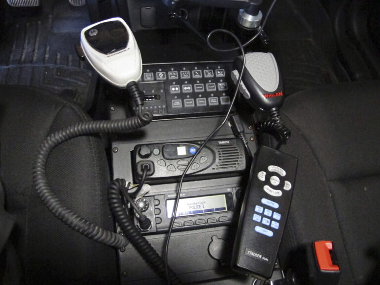 In this Thursday, Oct. 6, 2016 photo, a radio in a police cruiser sits between the front seats in Naugatuck, Conn. (AP)