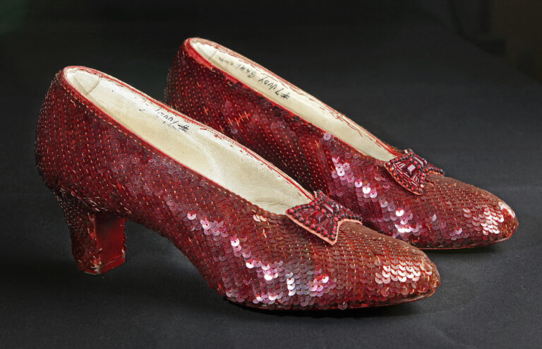 File- This Nov. 9, 2001, file photo shows the sequin-covered ruby slippers worn by Judy Garland in "The Wizard of Oz"  at the offices of Profiles in History in Calabasas, Calif. Smithsonian Museum officials started a Kickstarter fundraising drive Monday, Oct. 17, 2016,  to repair the iconic slippers from 1939’s “The Wizard of Oz” and create a new state-of-the-art display case for them at the National Museum of American History.  (AP Photo/Reed Saxon, File) (AP)