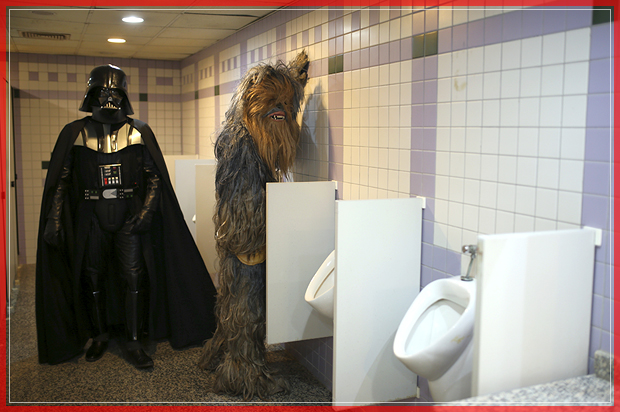 CORRECTS NAME - Fans dressed as Darth Vader, left, and Chewbacca are pictured in a bathroom as they attend 53rd Antalya Film Festival in Mediterranean Turkish resort of Antalya, Turkey, Monday, Oct. 17, 2016. (AP Photo/Emre Tazegul) (AP)
