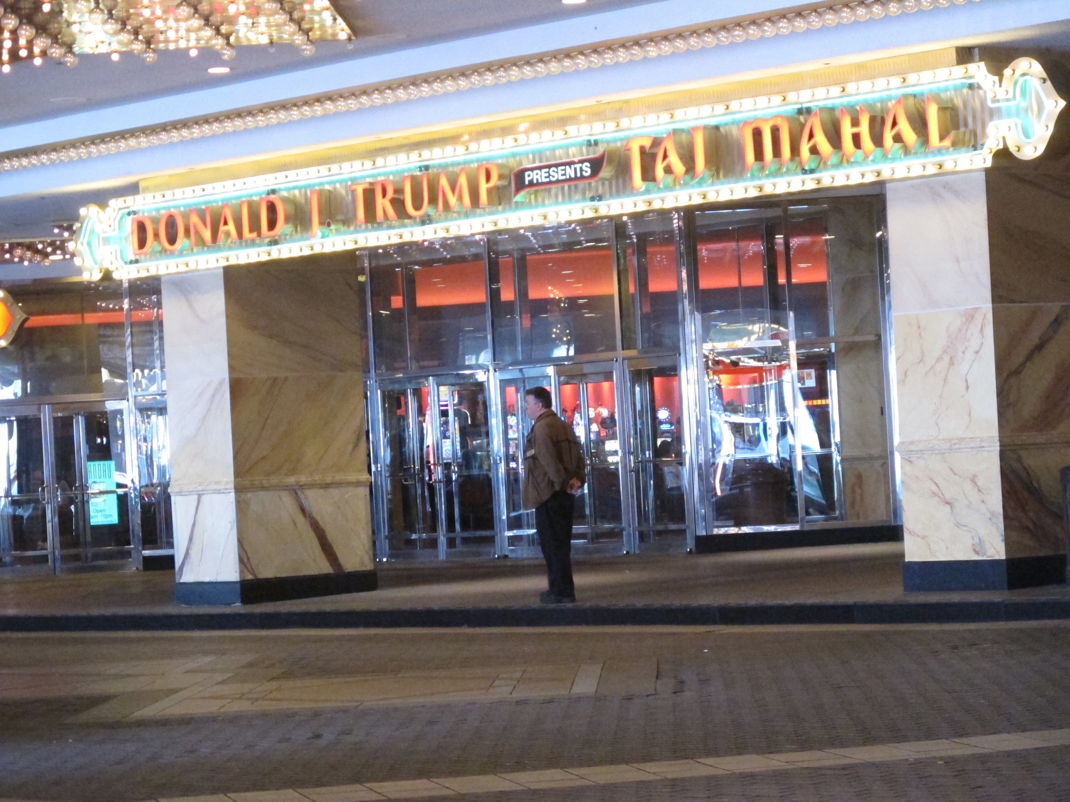 In this May 17, 2016 photo, a man waits at the main entrance to the Trump Taj Mahal casino in Atlantic City, N.J. (AP)