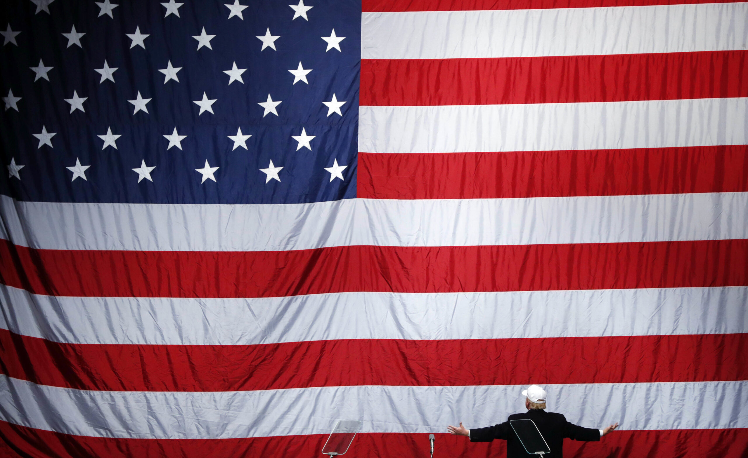 FILE - In this Sunday, Nov. 6, 2016 file photo, Republican presidential candidate Donald Trump turns to face the U.S. flag at a campaign rally in Sterling Heights, Mich. (AP)