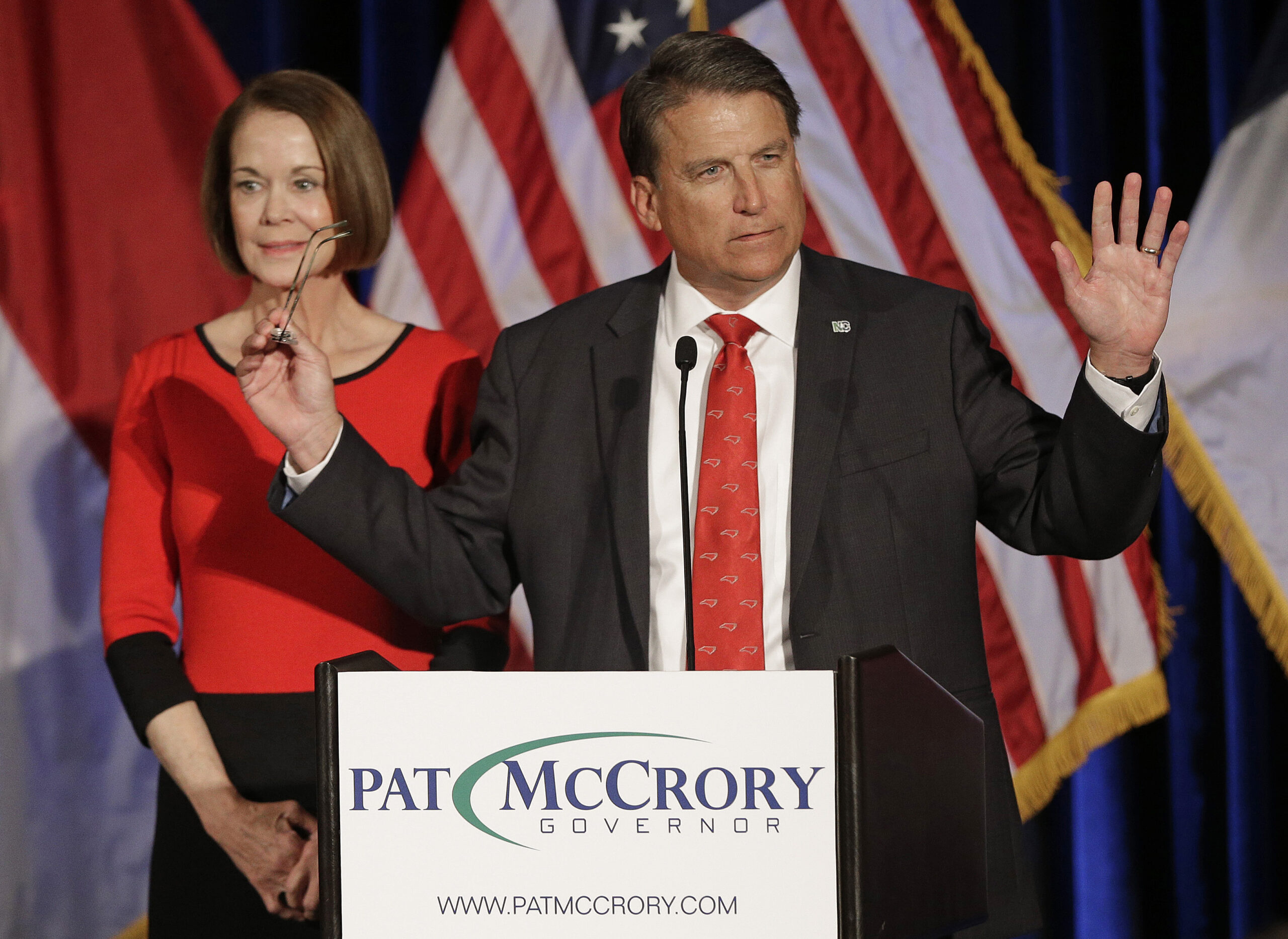 North Carolina Gov. Pat McCrory speaks to supporters as his wife Ann McCrory listens at an election rally in Raleigh, N.C., Wednesday, Nov. 9, 2016. The race between McCrory and Democrat Roy Cooper remains too close to call.(AP Photo/Chuck Burton) (AP)
