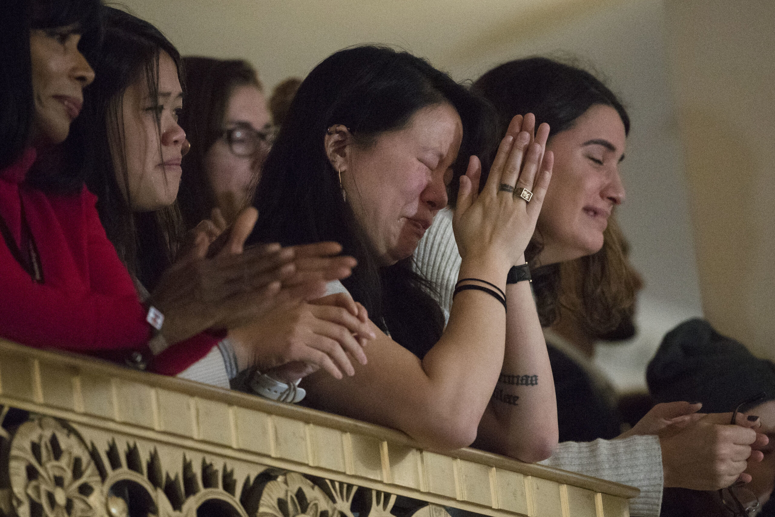 Audience members listen as Democratic presidential candidate Hillary Clinton speaks in New York, Wednesday, Nov. 9, 2016. (AP Photo/Matt Rourke)