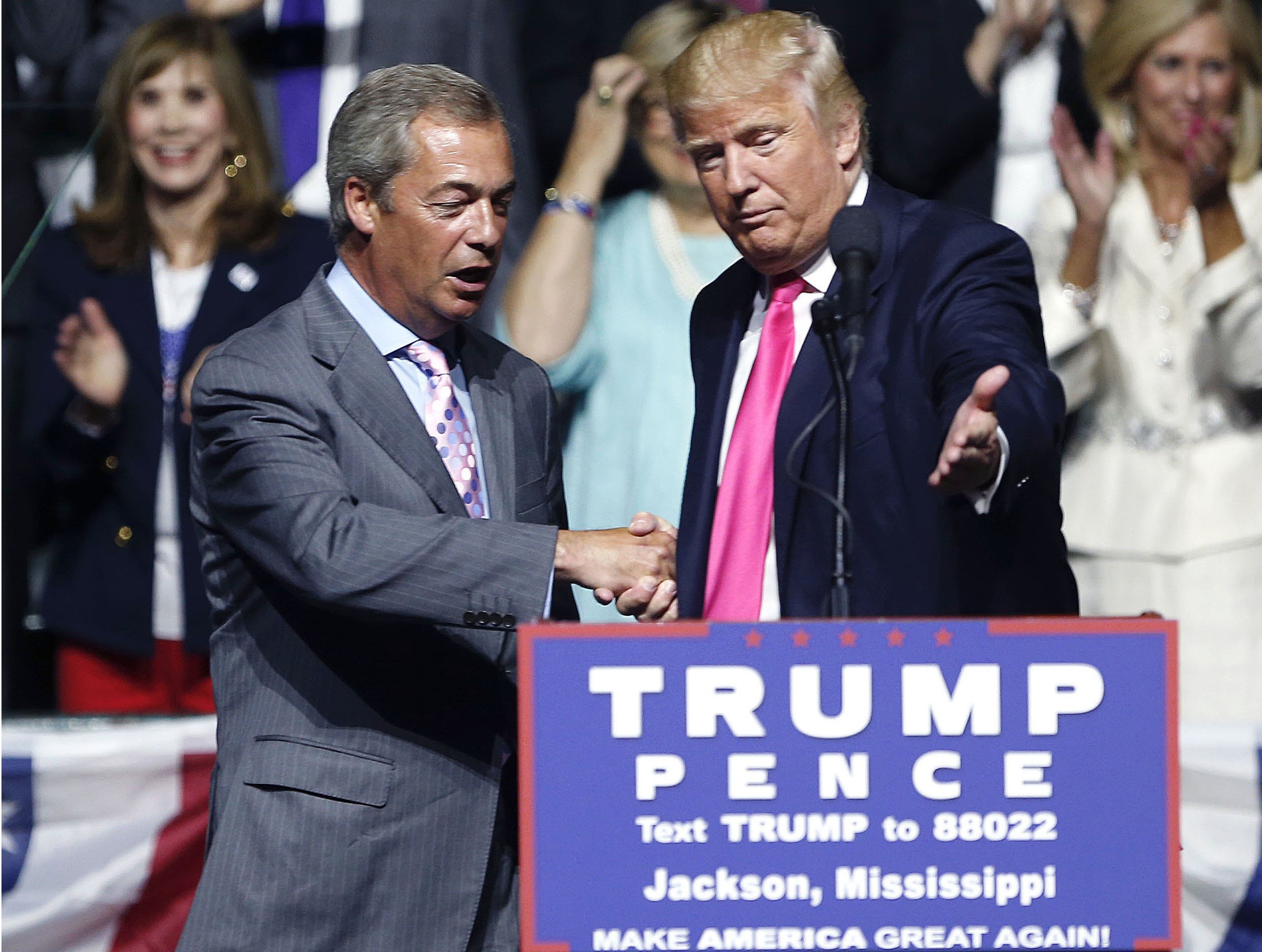 FILE - In this Wednesday, Aug. 24, 2016, file photo, then-Republican presidential candidate Donald Trump, right, welcomes pro-Brexit British politician Nigel Farage. (AP)