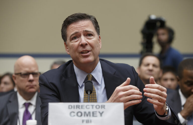 FILE - In this July 7, 2016 file photo, FBI Director James Comey testifies on Capitol Hill in Washington before the House Oversight Committee to explain his agency's recommendation to not prosecute Hillary Clinton. In a letter from Comey released on Nov. 6, he tells Congress review of additional Clinton emails does not change conclusion she should not face charges. (AP Photo/J. Scott Applewhite, File) (AP)