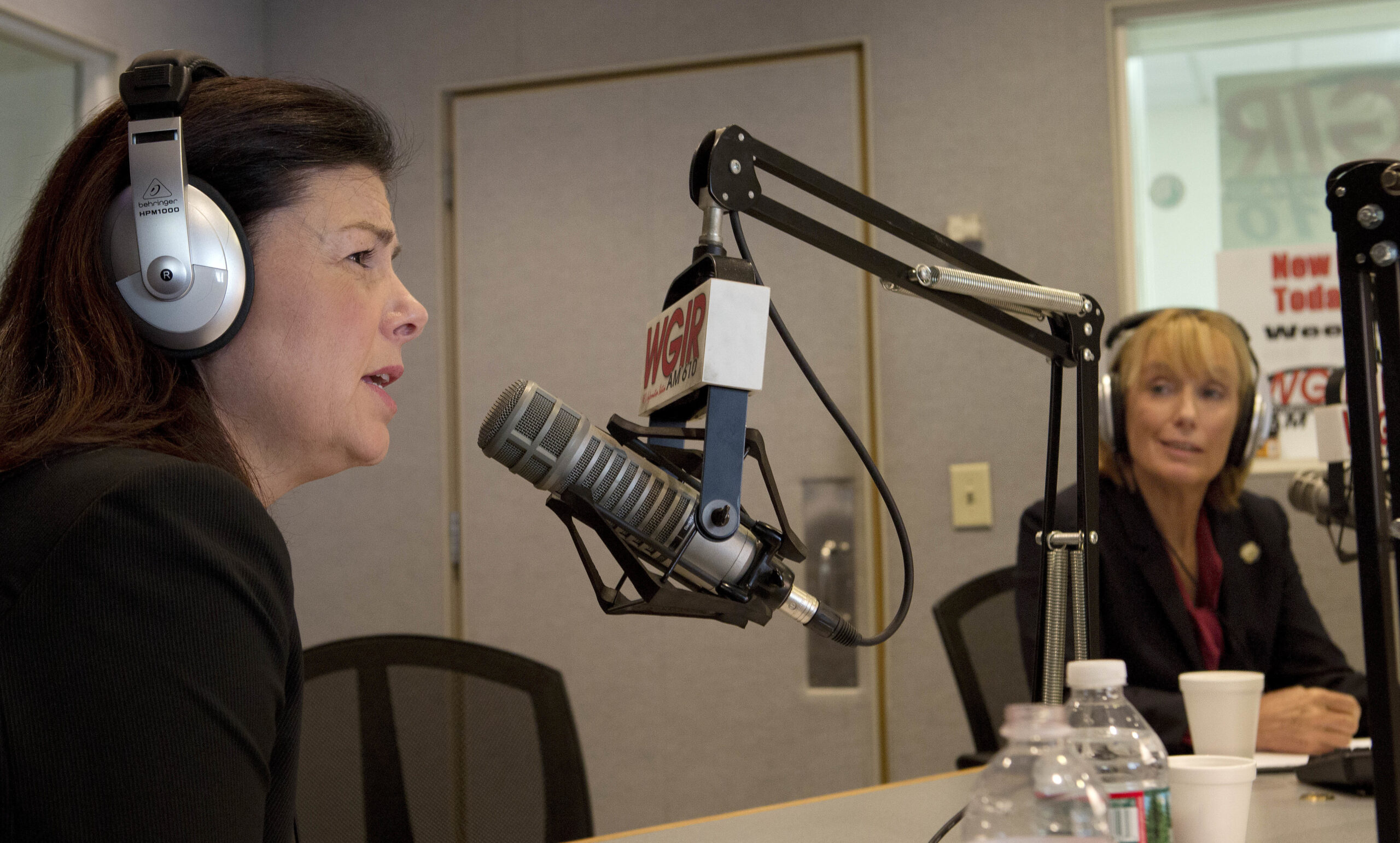FILE - In this Oct. 14, 2016, file photo, candidates for U.S. Senate, Republican incumbent, Kelly Ayotte, left, and Democratic challenger Gov. Maggie Hassan speak during a debate at WGIR in Manchester, N.H. Hillary Clinton is not the only one playing defense after the FBI’s disclosure last week of additional emails relevant to its probe of her use of a private email server. Other Democrats are under the gun, too, in dozens of down-ballot races that will determine whether they control the House and Senate next year. The campaign of Ayotte was quick to put out a digital advertisement entitled “Dodges” that spliced television news clips on the renewed email controversy with older snippets of her opponent Hassan, hemming and hawing when asked if Clinton is honest and trustworthy. (AP Photo/Jim Cole, File) (AP)