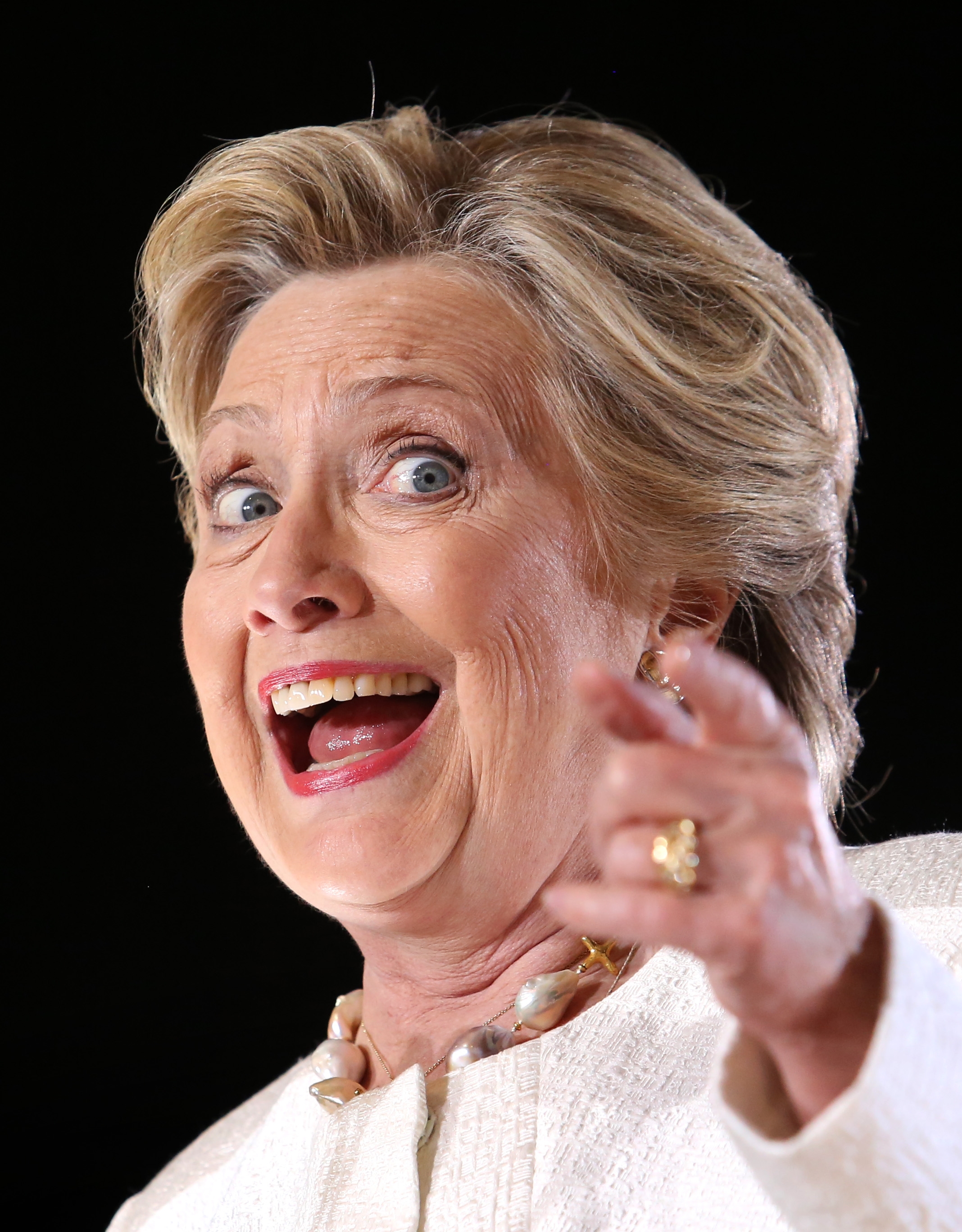 Democratic presidential candidate Hillary Clinton jokes about Republican presidential candidate Donald Trump during a rally in Sanford, Fla., Tuesday, Nov. 1, 2016. (Joe Burbank/Orlando Sentinel via AP) (Joe Burbank/Orlando Sentinel via AP)