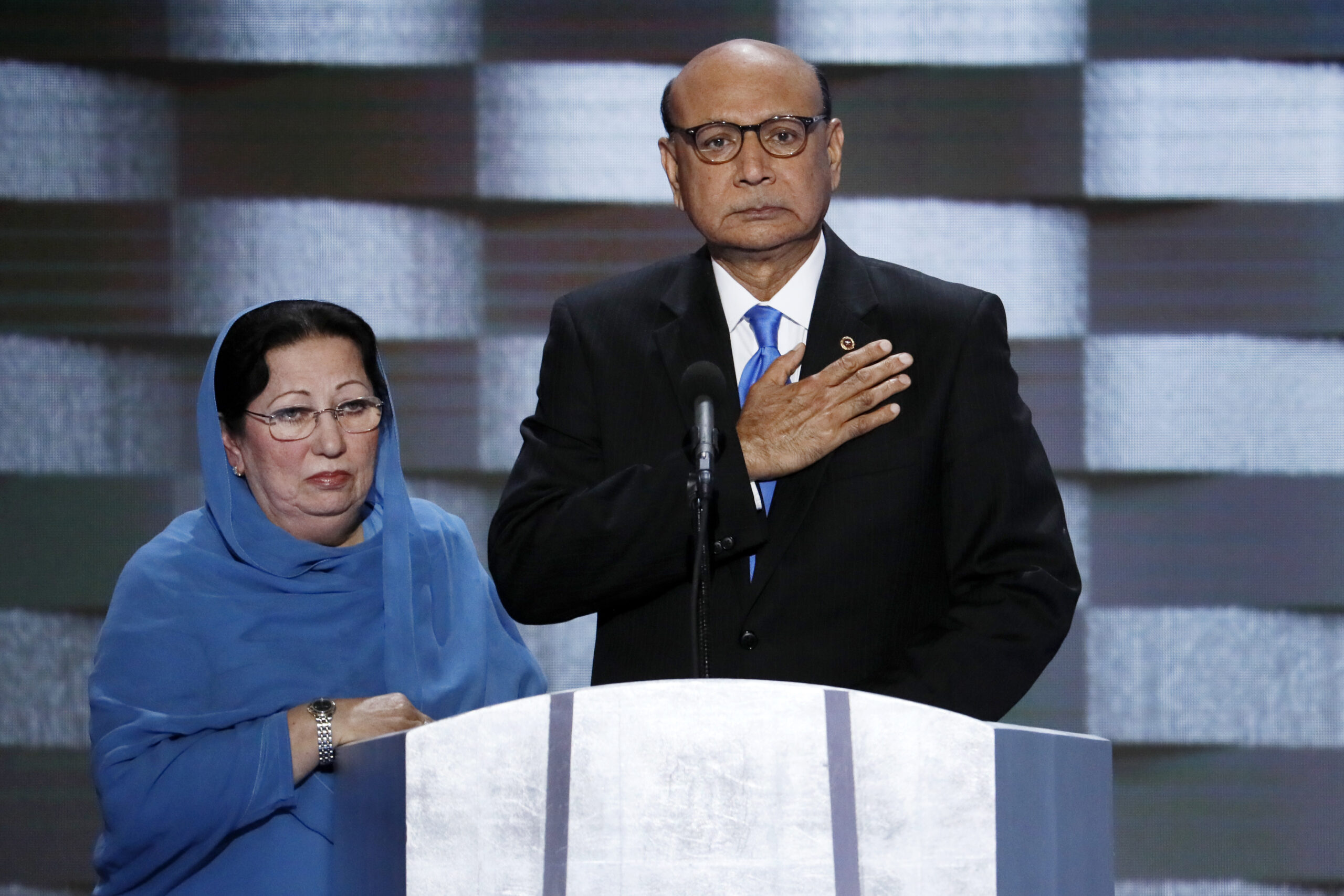 FILE - In this July 28, 2016, file photo, Khizr Khan, father of fallen Army Capt. Humayun Khan and his wife Ghazala speak during the final day of the Democratic National Convention in Philadelphia. Many Muslim Americans cringe at the way they have been portrayed by candidates during the presidential campaign, either as potential terrorists or as eyes and ears who can help counterterrorism efforts. Those descriptions have been offered by Donald Trump and Hillary Clinton, respectively. And they trouble Muslims who complain they are being pigeonholed and their concerns on other issues ignored. (AP Photo/J. Scott Applewhite, File) (AP)