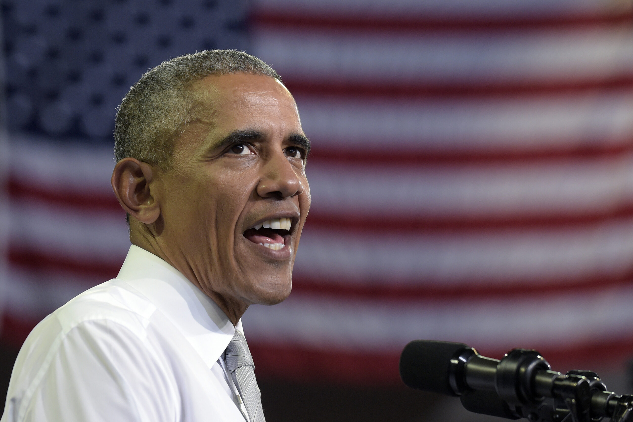 In this Oct. 28, 2016, photo, President Barack Obama speaks during a campaign event for Democratic presidential candidate Hillary Clinton in Orlando, Fla. The latest clamor over Clinton’s emails has put Obama in a spot where no president wants to be: caught between his attorney general, his FBI director and his preferred White House successor. (AP Photo/Susan Walsh) (AP)