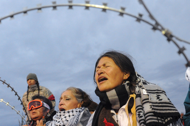A protest against plans to pass the Dakota Access pipeline near the Standing Rock Indian Reservation, near Cannon Ball, North Dakota, November 27, 2016. (Reuters/Stephanie Keith)