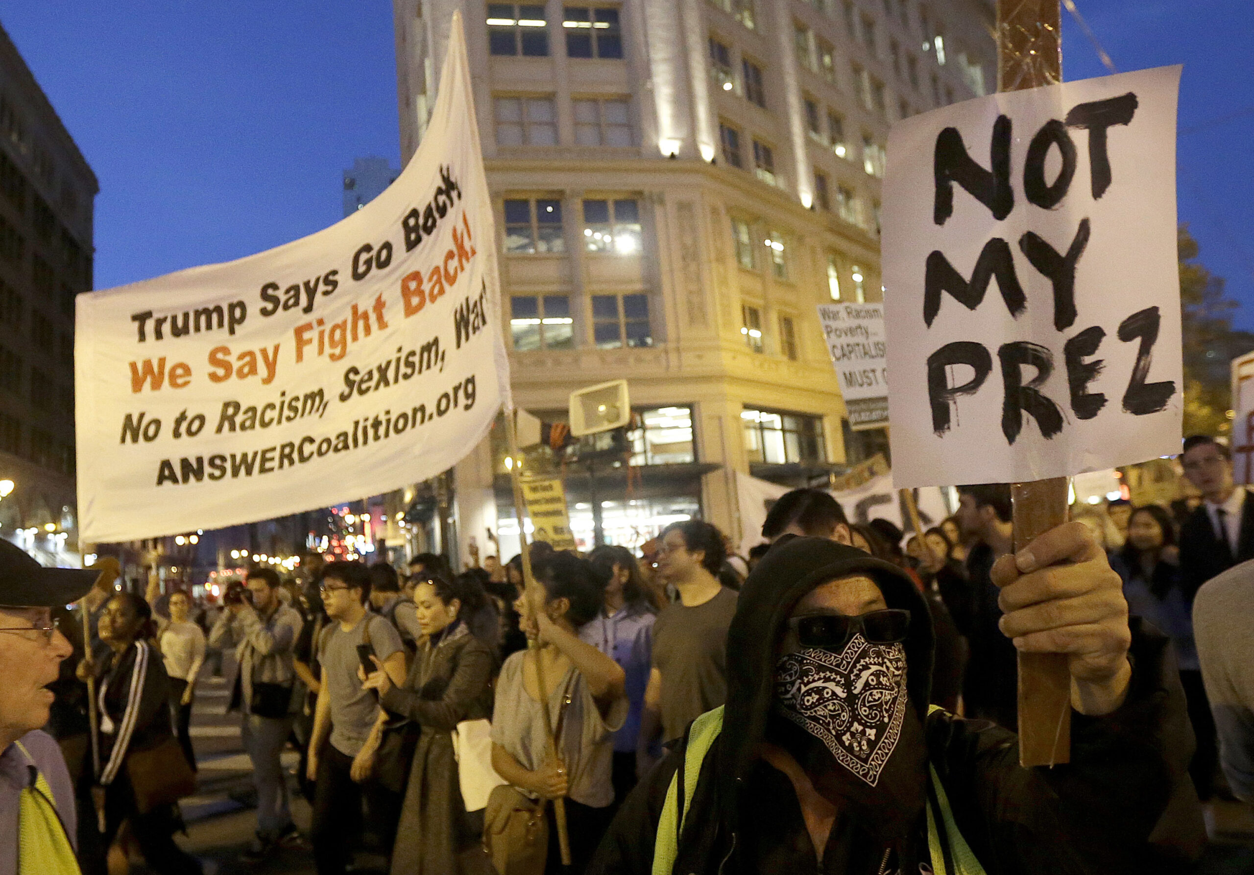 Protesters march in opposition of Donald Trump's presidential election victory in San Francisco, Wednesday, Nov. 9, 2016. (AP)