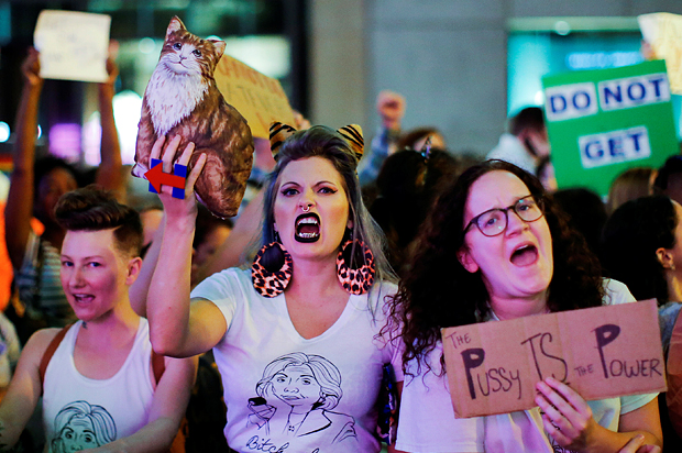 Women protest in front of Trump Tower (Reuters/Eduardo Munoz)