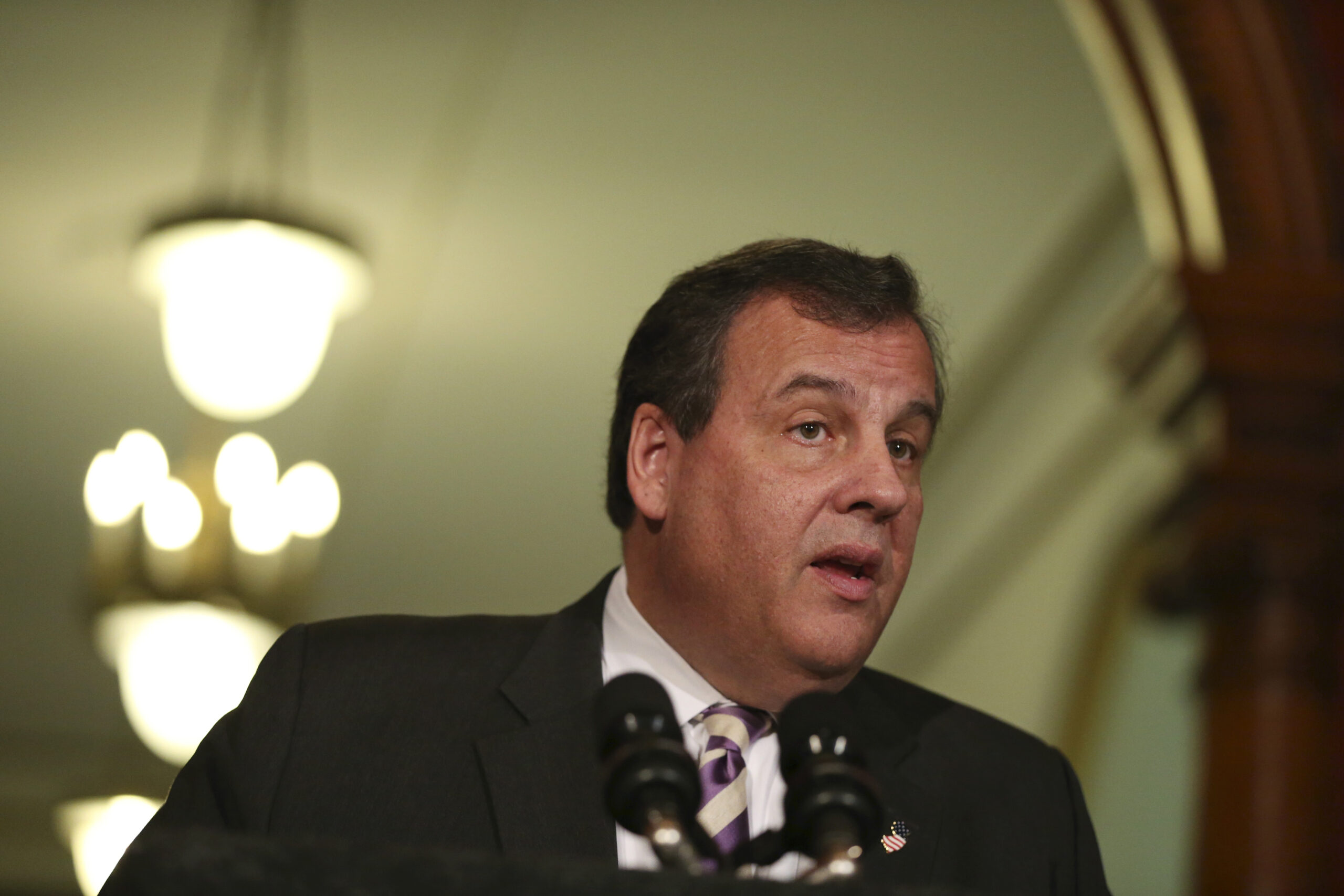 New Jersey Gov. Chris Christie stands in the Statehouse rotunda as he announces that work will begin immediately on a complete renovation of the building, Tuesday, Nov. 29, 2016, in Trenton, N.J. Christie said the current condition of the Statehouse is "shameful" and notes that there hasn't been a major upgrade since 1958. Parts of the building date to the 18th century. The Republican governor said that staff will be moved into other office space by July for a four-year, $300 million project. (AP Photo/Mel Evans) (AP)