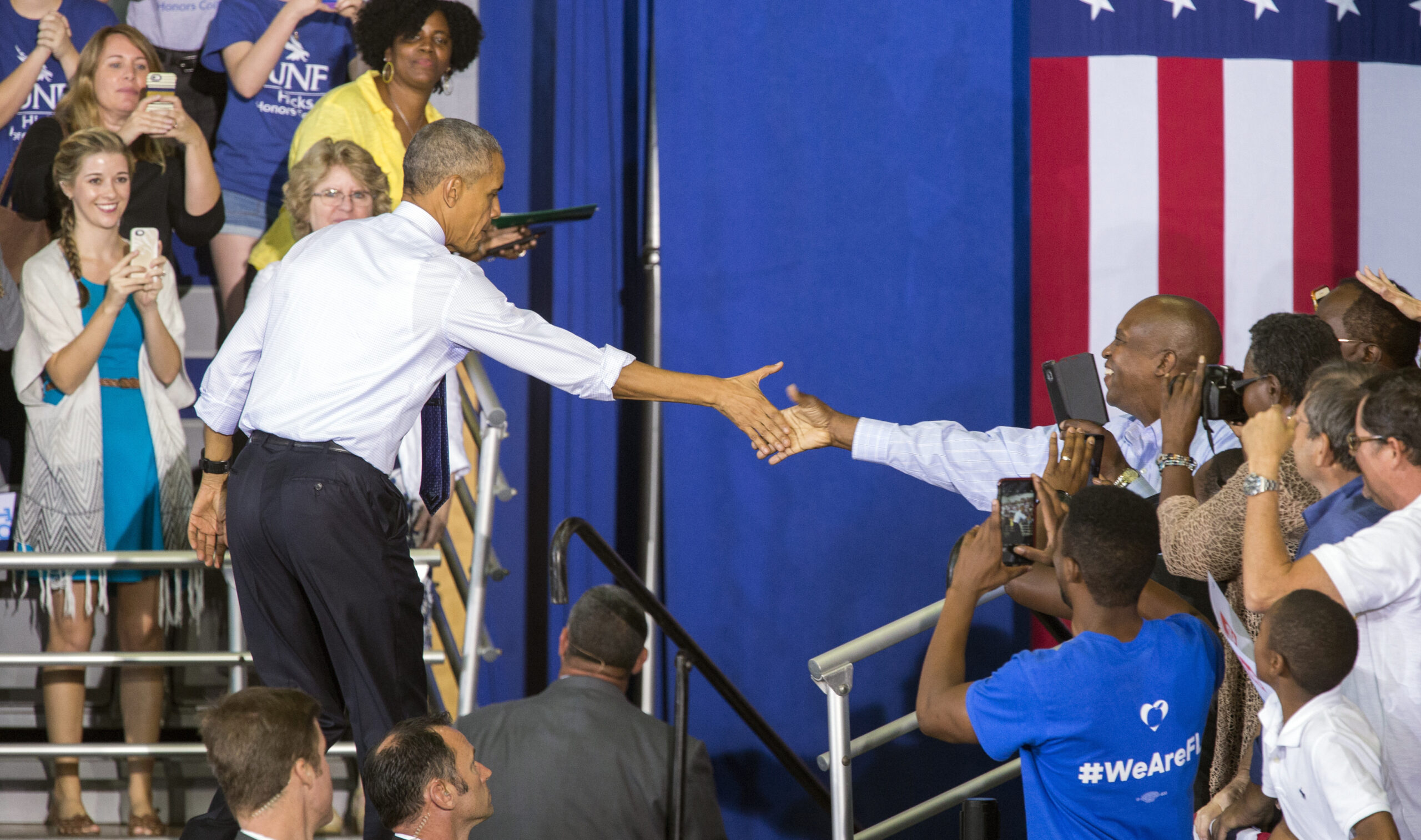 President Barack Obama shakes hand at a campaign rally for Democratic presidential candidate Hillary Clinton at the University of North Florida Arena in Jacksonville, Fla., Thursday, Nov. 3, 2016. (AP)