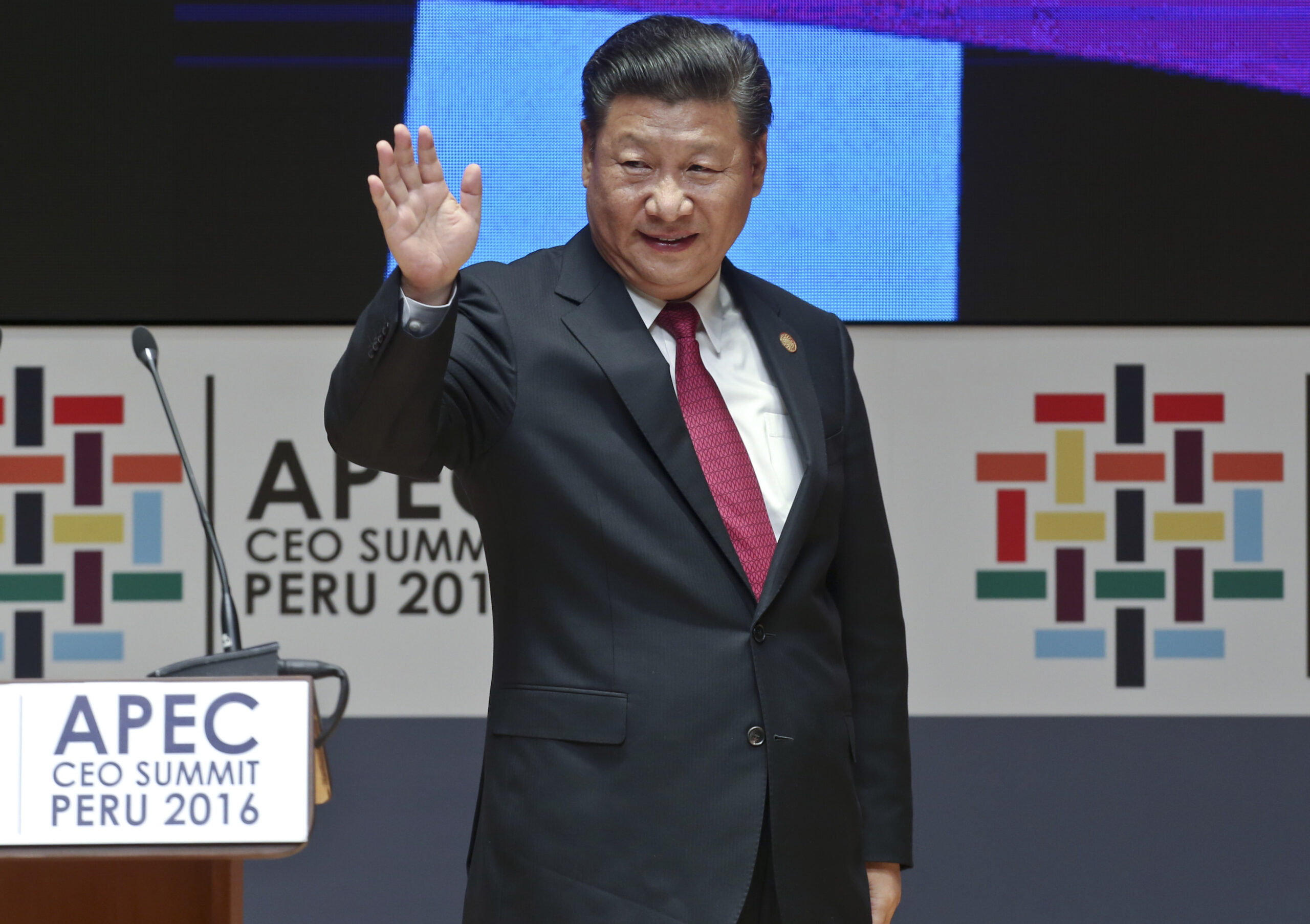 China's President Xi Jinping waves after speaking at the CEO summit during the annual Asia Pacific Economic Cooperation (APEC) forum in Lima, Peru, Saturday, Nov. 19, 2016. (AP Photo/Esteban Felix) (AP)