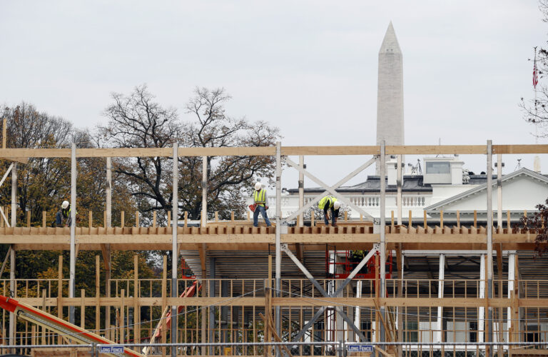 Construction continues on the presidential reviewing stand on Pennsylvania Avenue in Washington, Friday, Nov. 25, 2016, looking toward the White House and the Washington Monument. (AP)