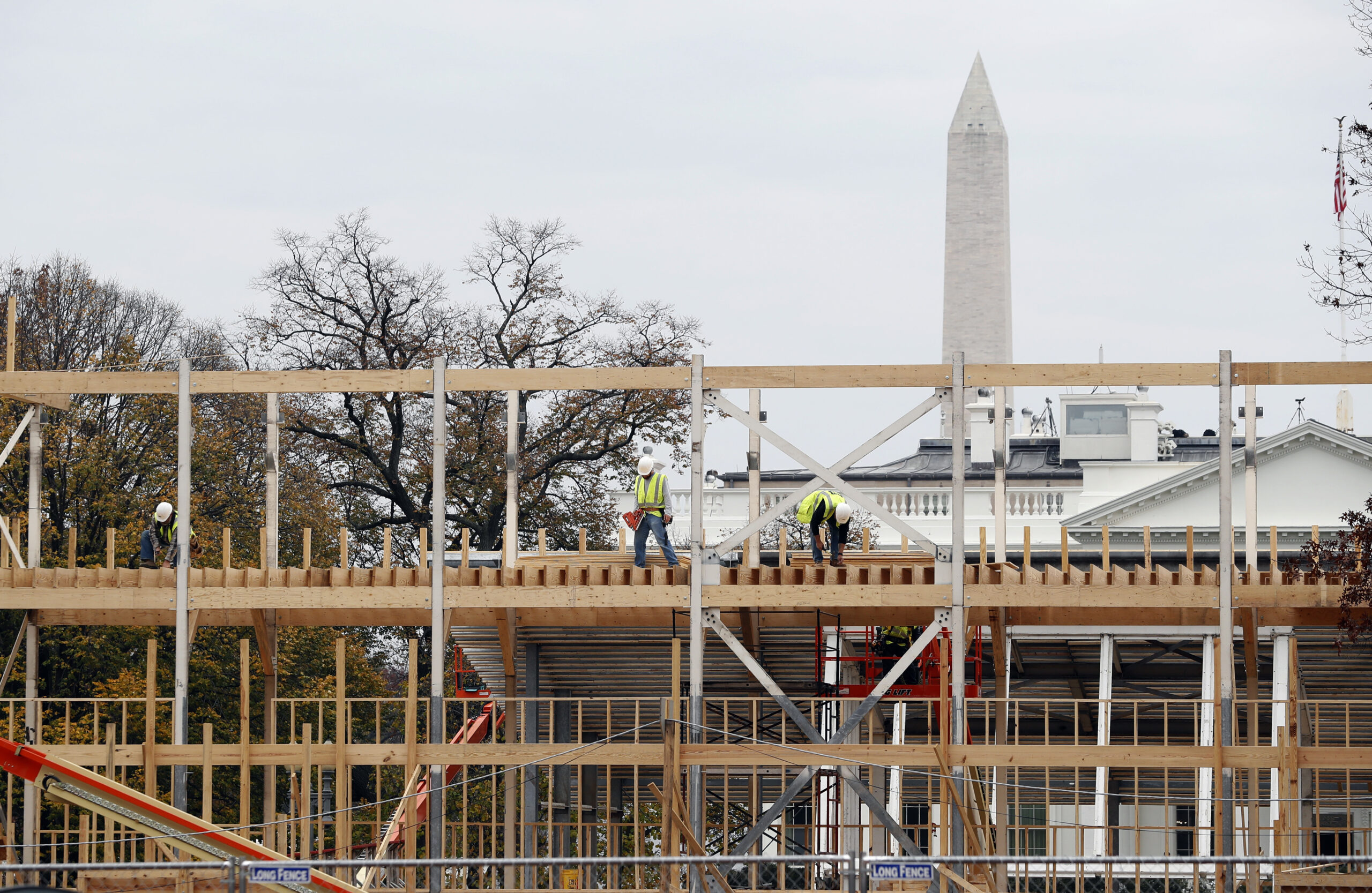 Construction continues on the presidential reviewing stand on Pennsylvania Avenue in Washington, Friday, Nov. 25, 2016, looking toward the White House and the Washington Monument. (AP)