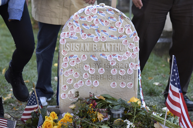 People visit the grave of Susan B. Anthony at Mount Hope Cemetery in Rochester, New York November 8, 2016. (Reuters/Adam Fenster)