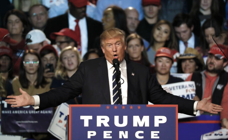 FILE - In this Tuesday, Nov. 8, 2016 file photo, Republican presidential candidate Donald Trump speaks at a campaign rally in Grand Rapids, Mich.  Trump pledged in his campaign to throw out what he called stifling regulations, including the financial rules that Congress built to prevent another crisis. As the Trump transition team asserts itself, an all-out repeal of the 2010 Dodd-Frank law that strengthened regulators’ oversight seems improbable.  (AP Photo/Paul Sancya, File) (AP)