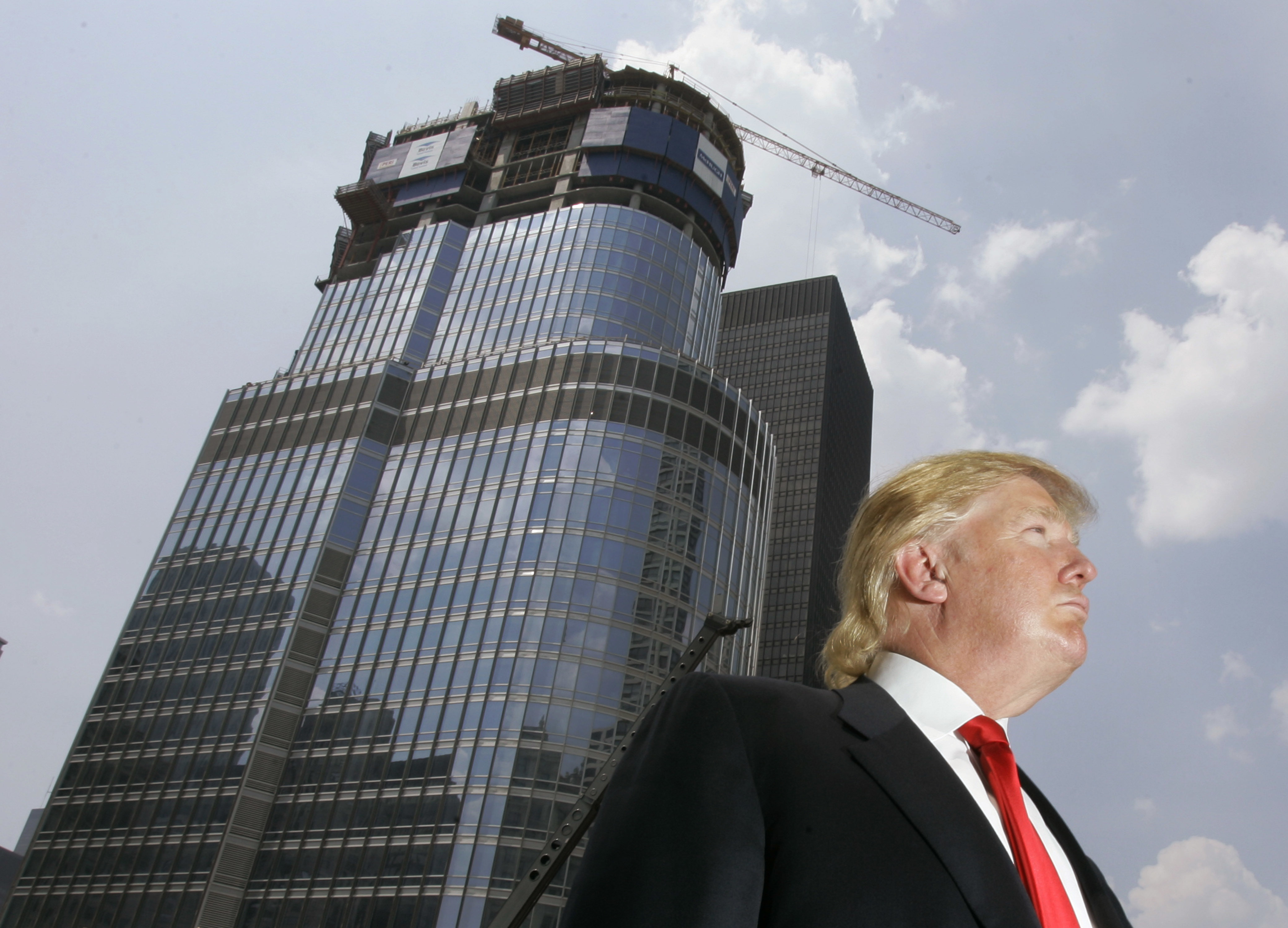 FILE - In this May 24, 2007, file photo, Donald Trump is profiled against his then-under construction 92-story Trump International Hotel & Tower in Chicago. Trump's hands-on, minutiae-obsessed management style will be tested by the presidency, a job in which his predecessor says that only the biggest and most difficult decisions even make the president's desk.  (AP Photo/Charles Rex Arbogast, File) (AP)