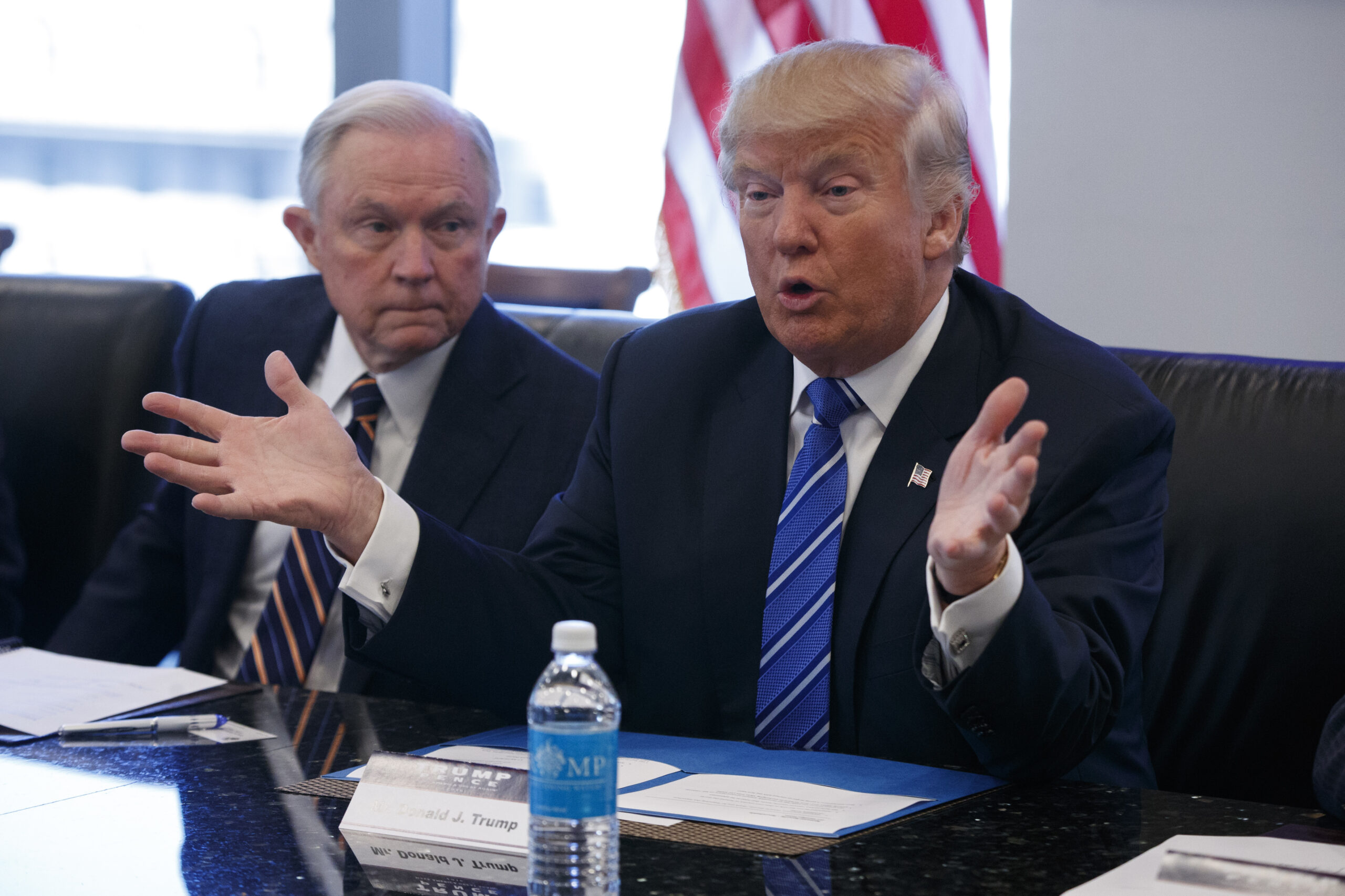 FILE - In this Oct. 7, 2016 file photo, Sen. Jeff Sessions, R-Ala. listens at left as then-Republican presidential candidate Donald Trump speaks during a national security meeting with advisers at Trump Tower in New York. (AP)