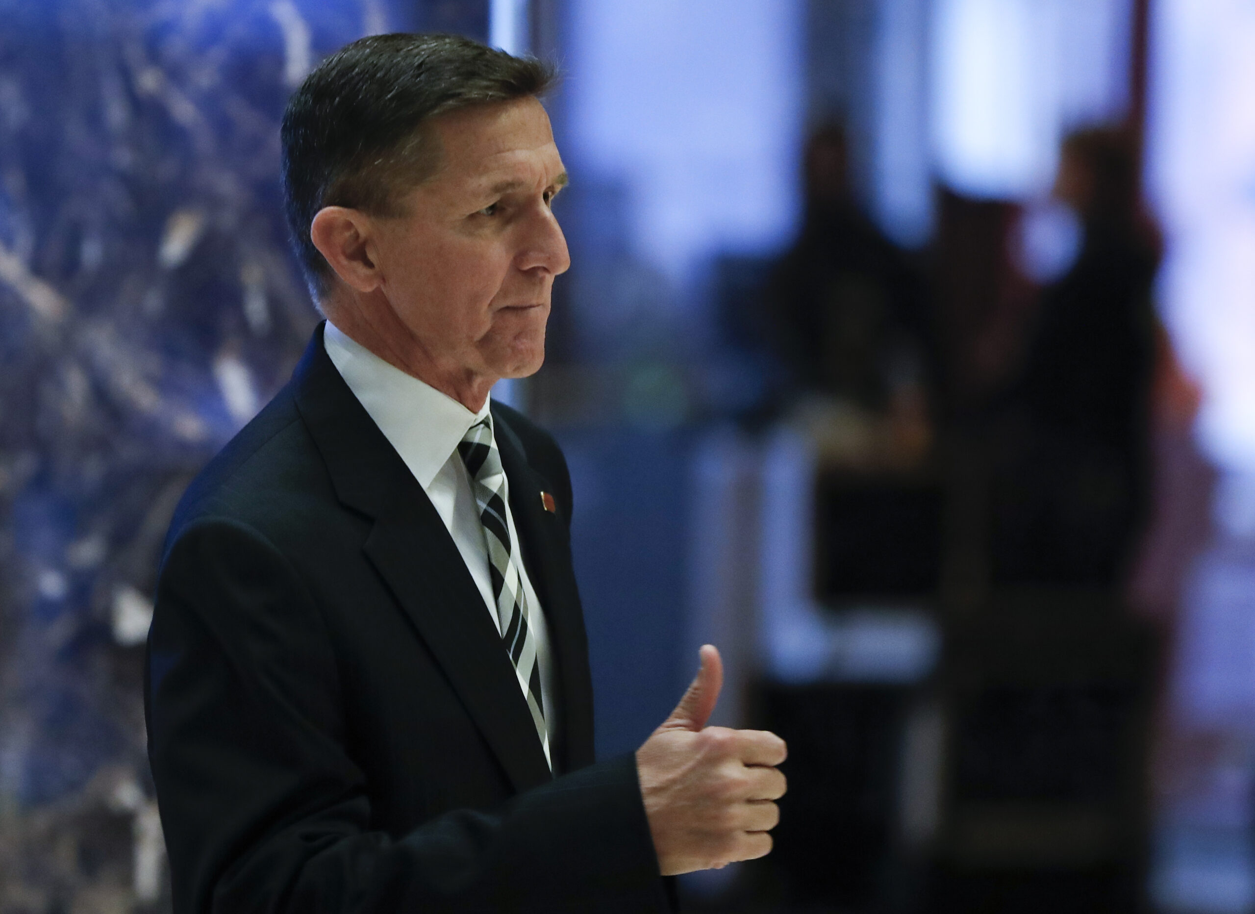 Retired Lt. Gen Michael Flynn gives the thumbs-up as he arrives at Trump Tower, Thursday, Nov. 17, 2016, in New York. (AP Photo/Carolyn Kaster) (AP)