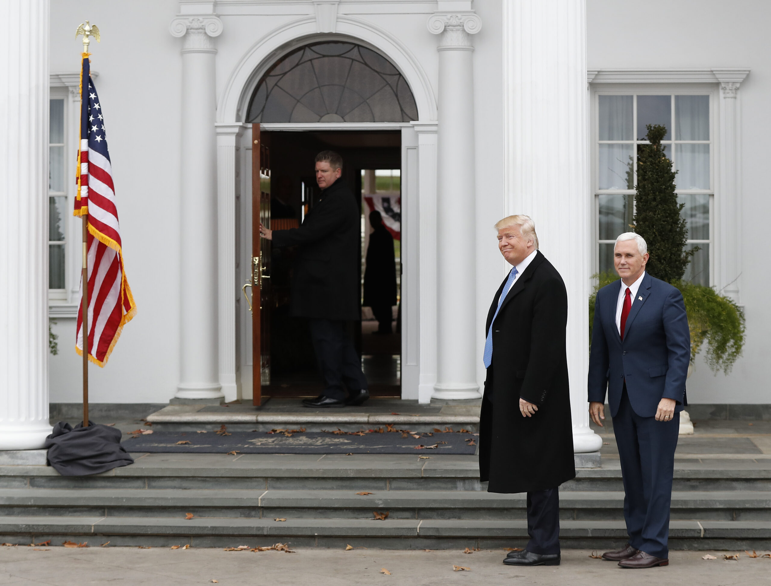 President-elect Donald Trump and Vice President-elect Mike Pence, right, arrive at the Trump National Golf Club Bedminster clubhouse, Sunday, Nov. 20, 2016 in Bedminster, N.J. (AP)
