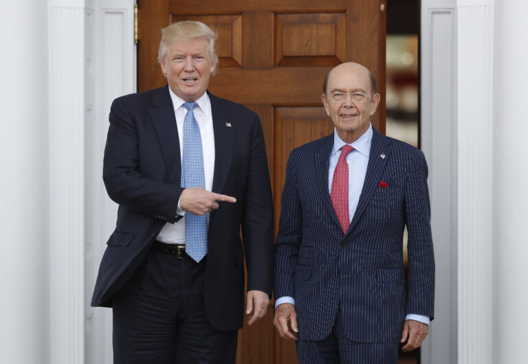 In this Sunday, Nov. 20, 2016, file photo, President-elect Donald Trump, left, stands with investor Wilbur Ross after meeting at the Trump National Golf Club Bedminster clubhouse in Bedminster, N.J. (AP)