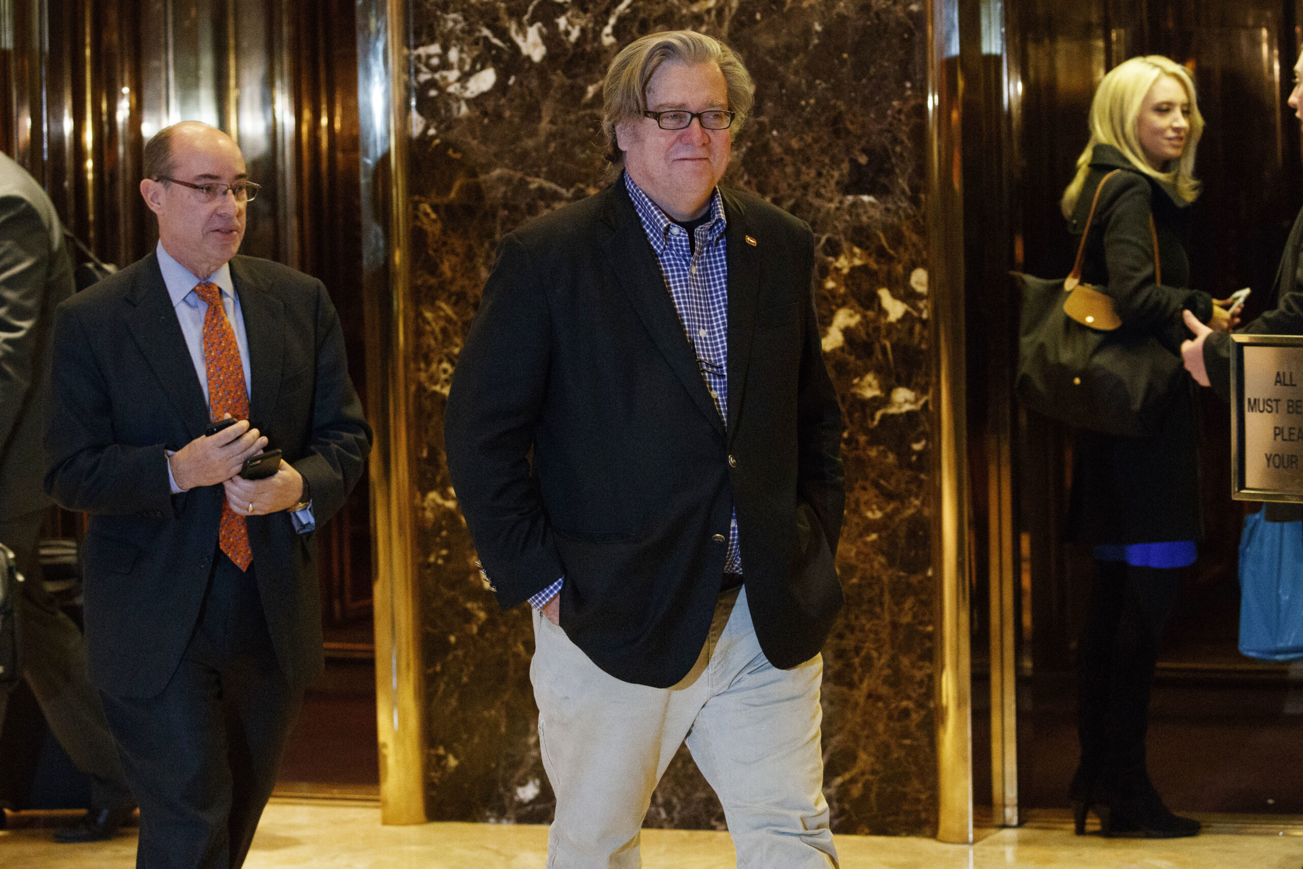 FILE - In this Friday, Nov. 11, 2016, file photo, Stephen Bannon, campaign CEO for President-elect Donald Trump, leaves Trump Tower in New York. Trump on Sunday named Republican Party chief Reince Priebus as White House chief of staff and conservative media owner Bannon as his top presidential strategist, two men who represent opposite ends of the unsettled GOP. (AP Photo/Evan Vucci, File) (AP)