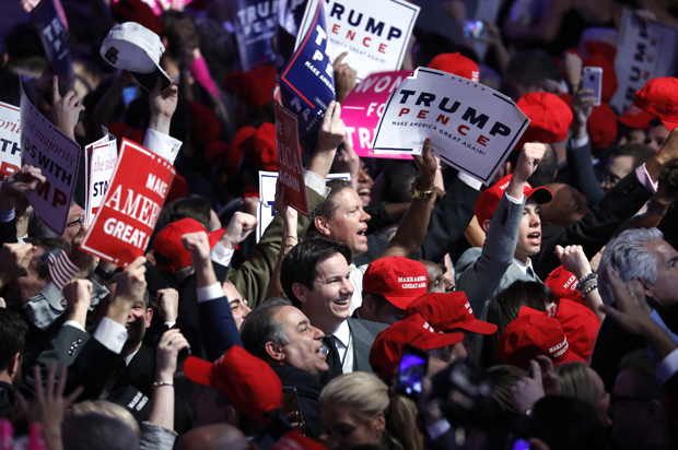 Supporters cheer as they wait for President-elect Donald Trump to give his acceptance speech (AP/Mary Altaffer)