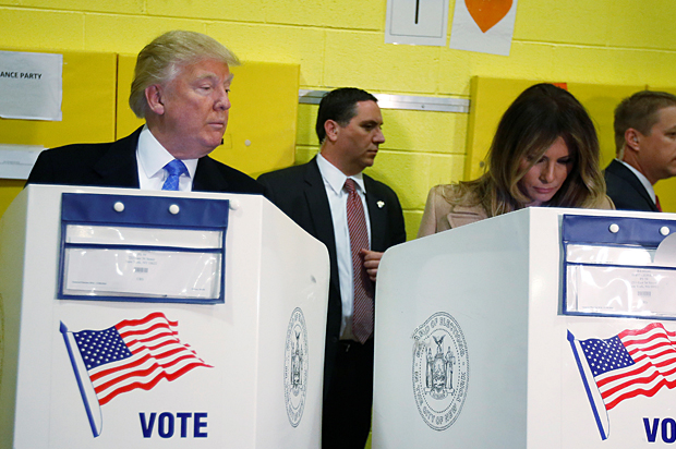 Donald Trump and Melania Trump vote at PS 59 in New York, New York, November 8, 2016. (Reuters/Carlo Allegri)
