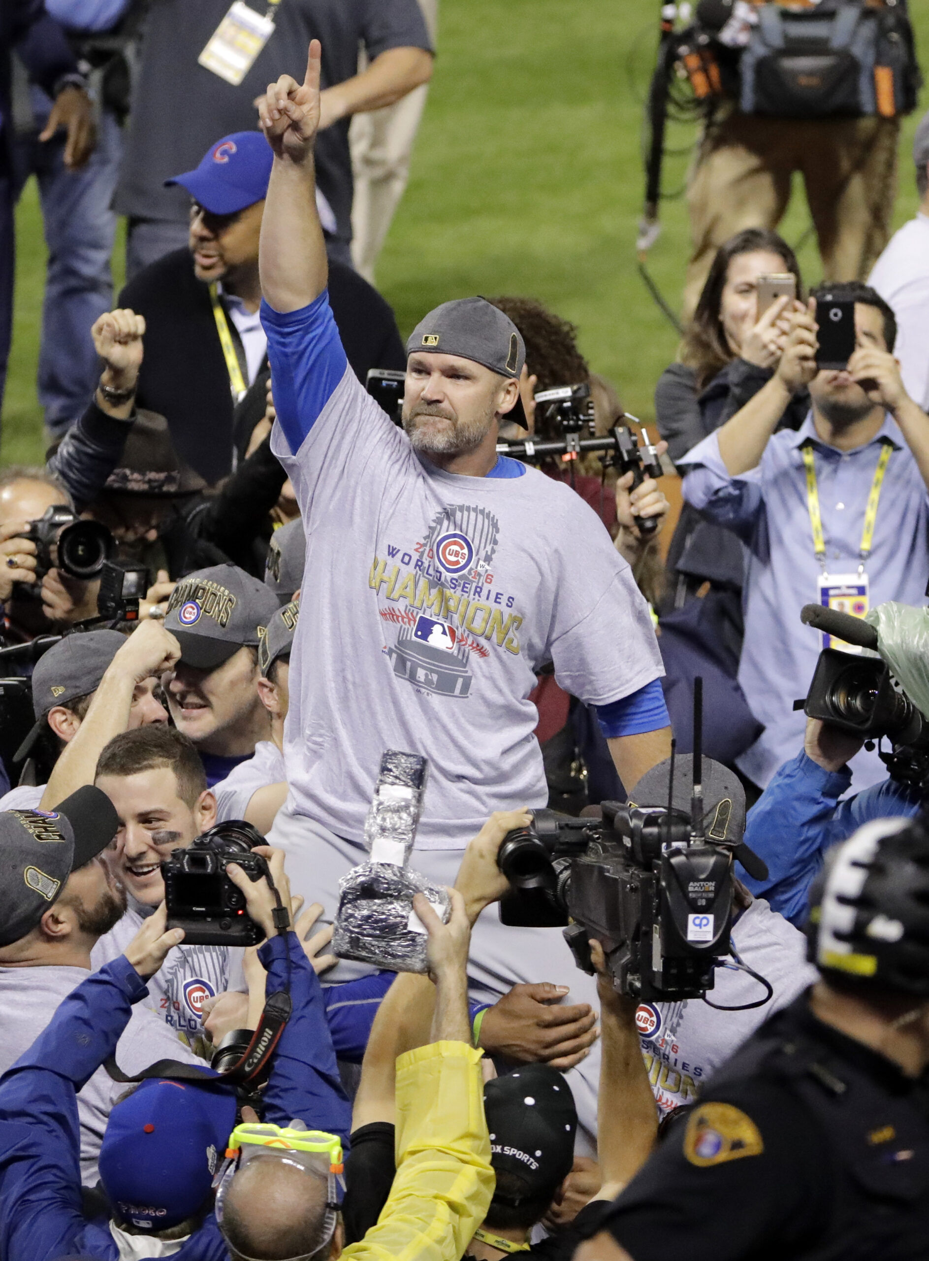 Chicago Cubs' David Ross is carried by teammates after Game 7 of the Major League Baseball World Series against the Cleveland Indians Thursday, Nov. 3, 2016, in Cleveland. The Cubs won 8-7 in 10 innings to win the series 4-3. (AP Photo/Gene J. Puskar) (AP)