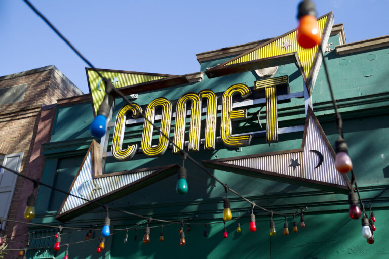 In this Dec. 5, 2016, photo, the front door of Comet Ping Pong pizza shop, in Washington, Monday, Dec. 5, 2016. For conspiracy theorists, "pizzagate" didn't end when a man brought a gun to a Washington restaurant in a misguided attempt to rescue child sex slaves, instead, the shooting fired up further belief in the baseless claims. On blogs, YouTube channels and internet radio shows devoted to conspiracy theories, some see Edgar Maddison Welch’s as the latest “false flag.” That’s a term for a cover-up or distraction orchestrated by the government or other powerful figures. ( AP Photo/Jose Luis Magana) (AP)