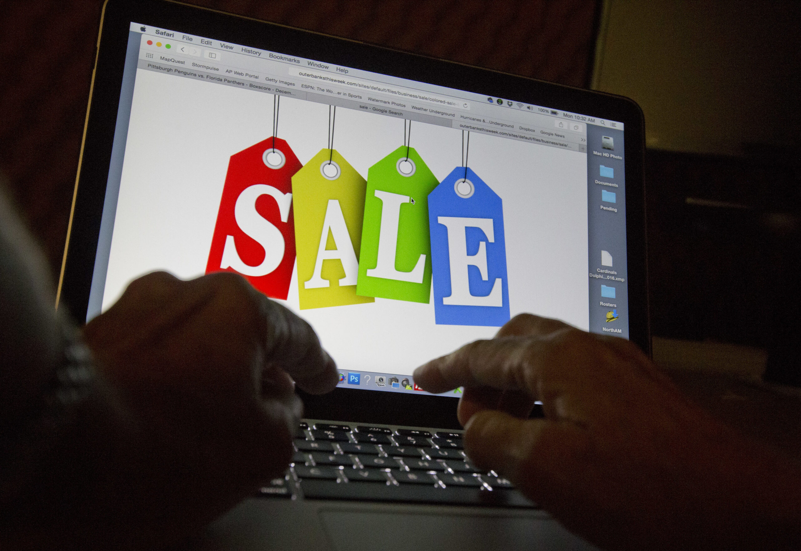 In this Monday, Dec. 12, 2016, photo, a person searches the internet for sales, in Miami. With the holidays fast approaching, more people are using their smartphones and other devices to get a handle on their last-minute shopping. Hackers are on the hunt too, looking to steal personal information from easy targets. But experts say a few precautions can go a long way in protecting yourself from cyber Scrooges. (AP Photo/Wilfredo Lee) (AP)