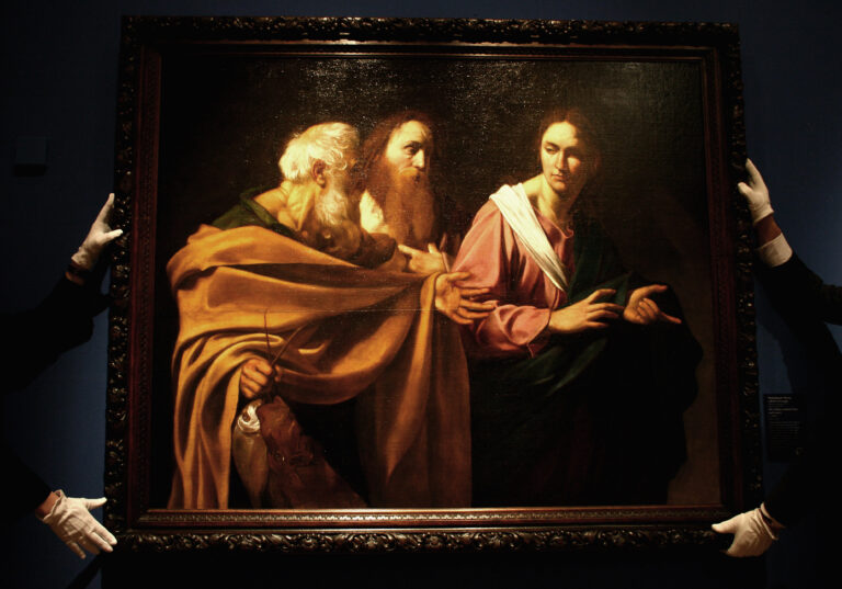 EDINBURGH, UNITED KINGDOM - NOVEMBER 12:  Staff at The Queen?s Gallery at the Palace of Holyrood view The Calling of Saints Peter and Andrew by Caravaggio on November 12, 2008 in Edinburgh, Scotland.The painting is one of two lost works which were discovered in the Queens collection, it hangs along side Boy Peeling Fruit, and it is on display for the first time in Scotland, as part of The Art of Italy in the Royal Collection.  (Photo by Jeff J Mitchell/Getty Images) (Getty/Jeff J Mitchell)
