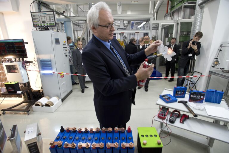 Company HE3DA President Jan Prochazka shows qualities of a new battery during the  official start of a battery production line in Prague, on Monday, Dec. 19, 2016. The new battery is based on nanotechnology and is supposed to be be more efficient, long-lasting, cheaper, lighter and above all safer. The battery is designed to store energy from renewable electric sources and cooperate with smart grids. Next planned type will be suitable for electric cars. (Michal Kamaryt /CTK via AP) (AP)