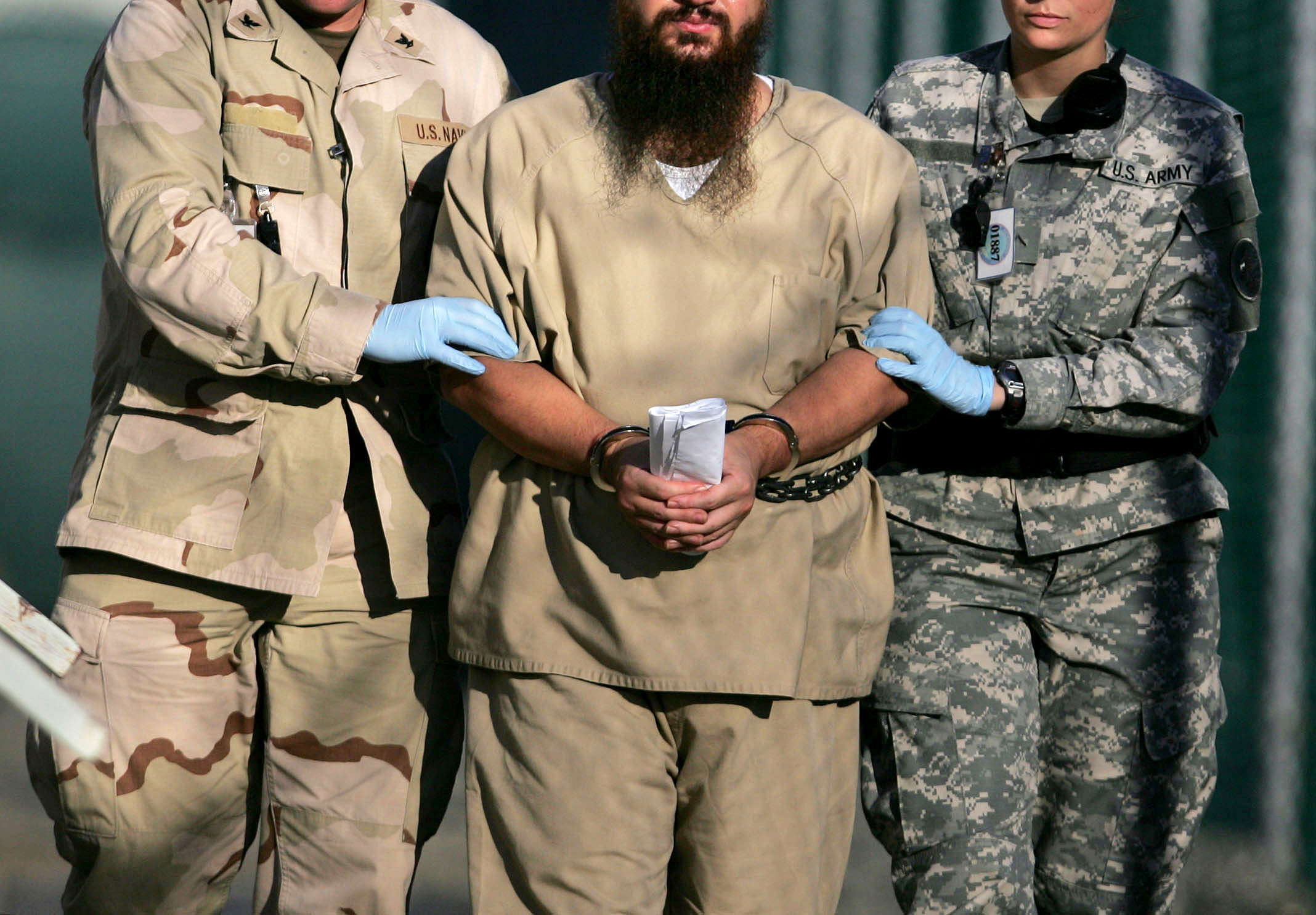 A shackled detaineein Guantanamo (AP/Brennan Llinsley)
