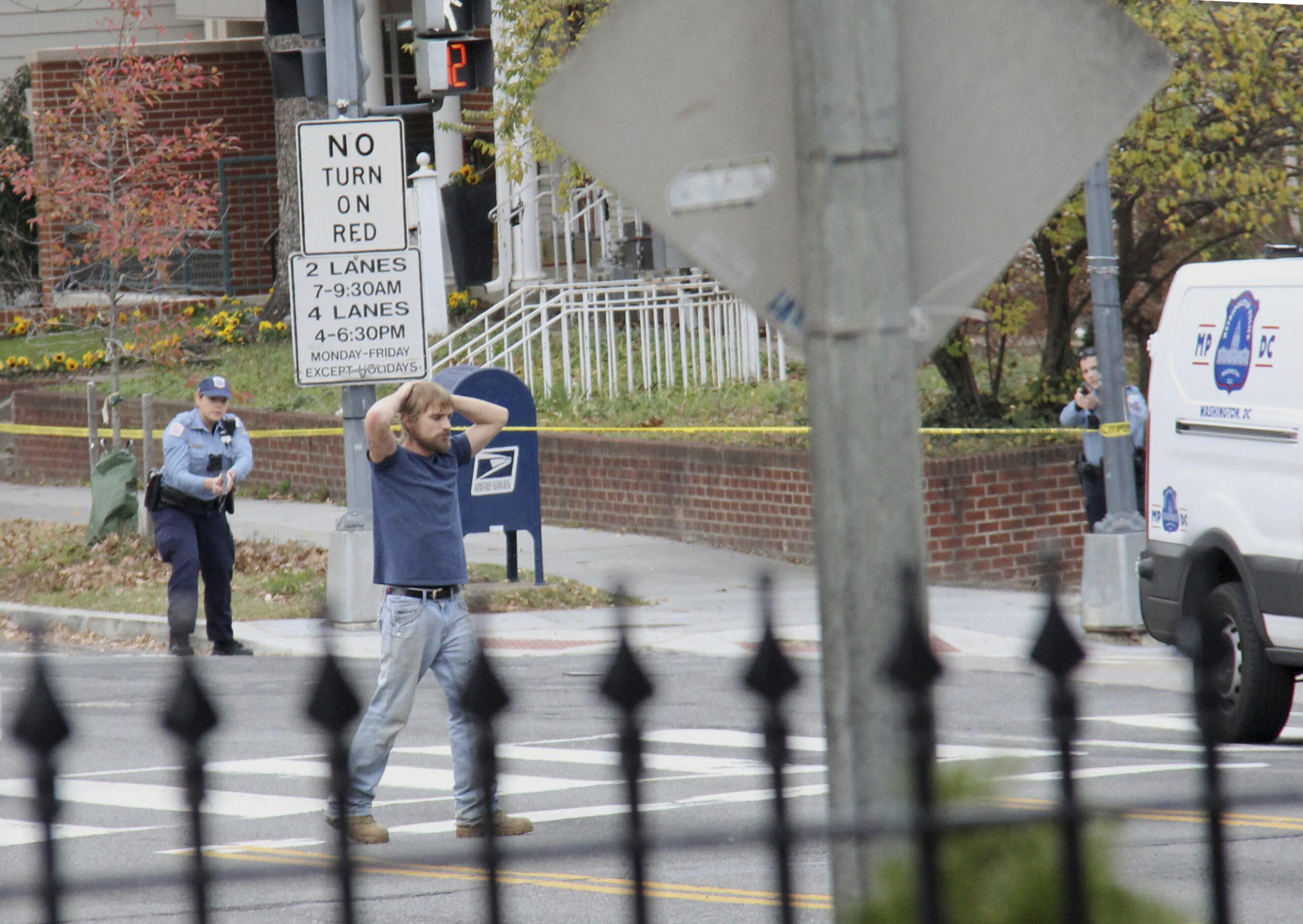 Edgar Maddison Welch, 28 of Salisbury, N.C., surrenders to police Sunday, Dec. 4, 2016, in Washington. (Sathi Soma via AP)