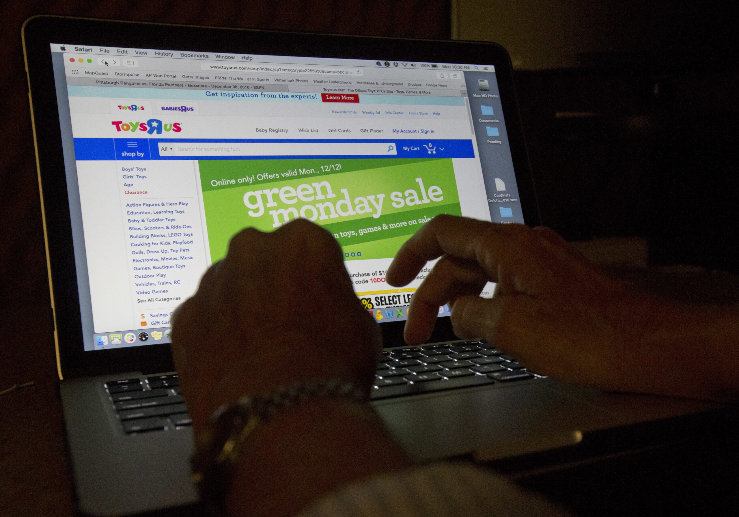 An online shopper searches different sites, Monday, Dec. 12, 2016, from Miami. Unfortunately, there’s no time like the holidays for fraud. Online shopping is convenient and popular, for shoppers and scammers alike. Experts suggest restricting your purchases to reputable vendors, and be wary of lookalike websites, where the name of a well-known brand is slightly off. Also, don’t click on emails and links from unfamiliar senders, and make payments only on secure sites indicated by a lock symbol or “https” in the web address. (AP Photo/Wilfredo Lee) (AP)