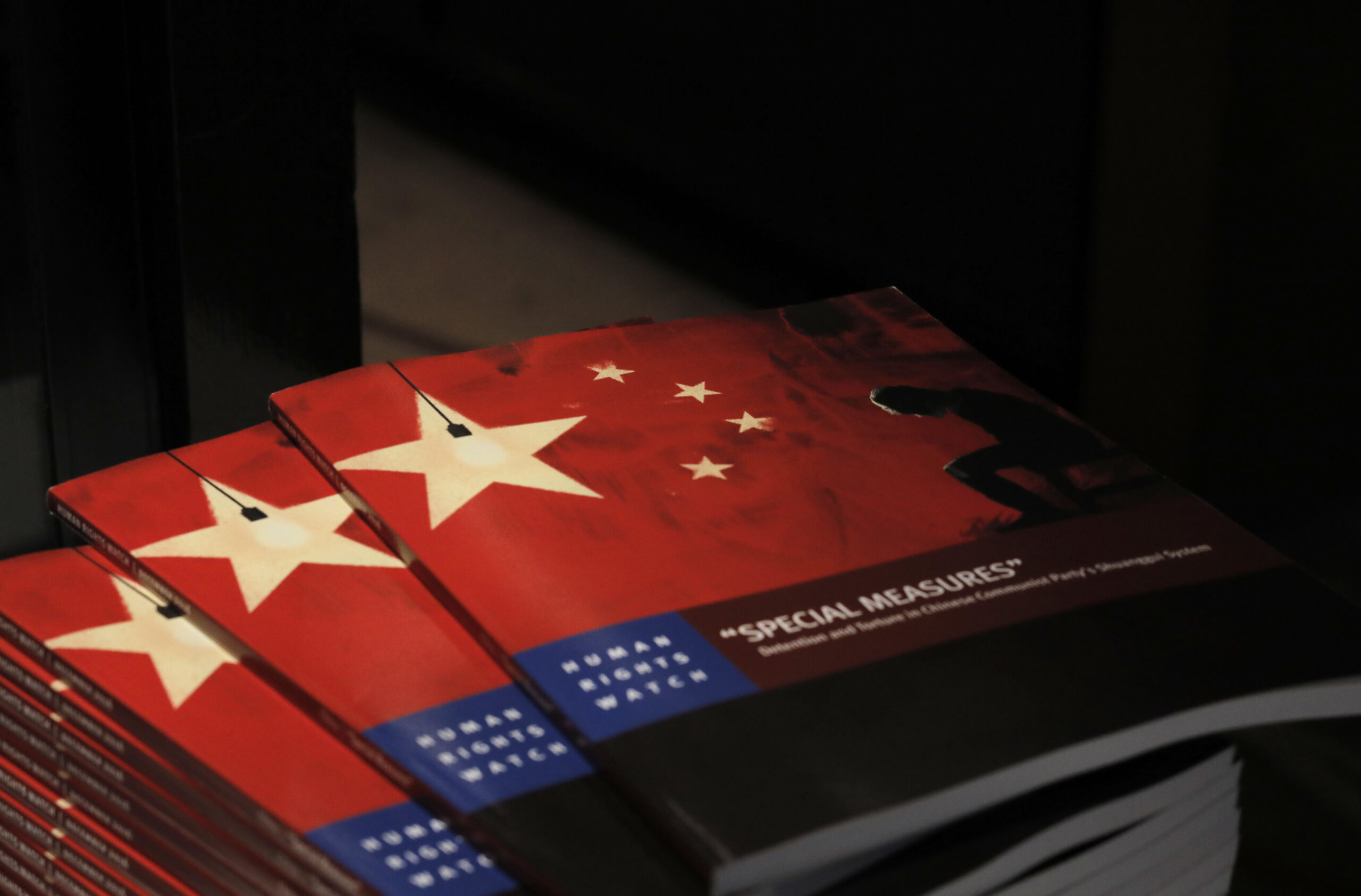 Copies of the new report by Human Rights Watch are seen at The Foreign Correspondents' Club in Hong Kong, Tuesday, Dec. 6, 2016. (AP)