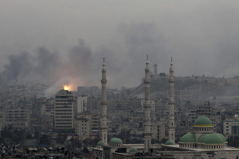 FILE -- In this Monday, Dec. 5, 2016 file photo, a ball of fire rises following an air strike hits insurgents positions in eastern neighborhoods of Aleppo, Syria. Aleppo shakes with explosions and gunfire day and night in both the government and rebel sides. But for supporters of President Bashar Assad at least, there is comfort in the growing sense of imminent victory in the city. A rebel defeat in Aleppo, Syria’s largest city and former commercial center, is likely to reverberate across the war-torn country, where opposition forces continue to hold out in smaller, more disconnected areas. (AP Photo/Hassan Ammar, File) (AP)