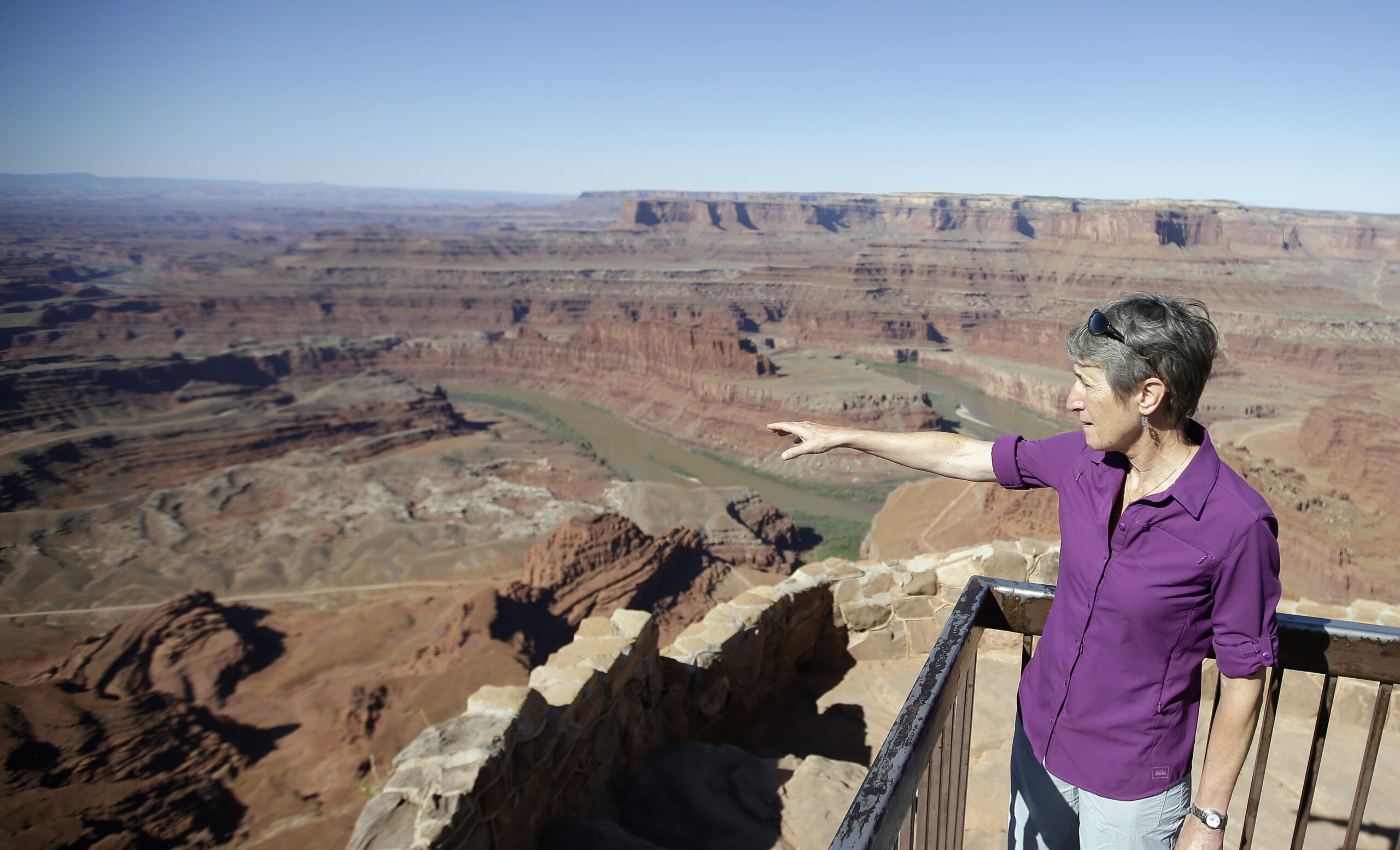 FILE - This July 14, 2016, file photo, U.S. Interior Secretary Sally Jewell looks from Dead Horse Point, near Moab, Utah, during a tour to meet with proponents and opponents to the "Bears Ears" monument proposal. President Barack Obama designated two national monuments Wednesday, Dec. 28, at sites in Utah and Nevada that have become key flashpoints over use of public land in the U.S. West. (AP Photo/Rick Bowmer, File) (AP)