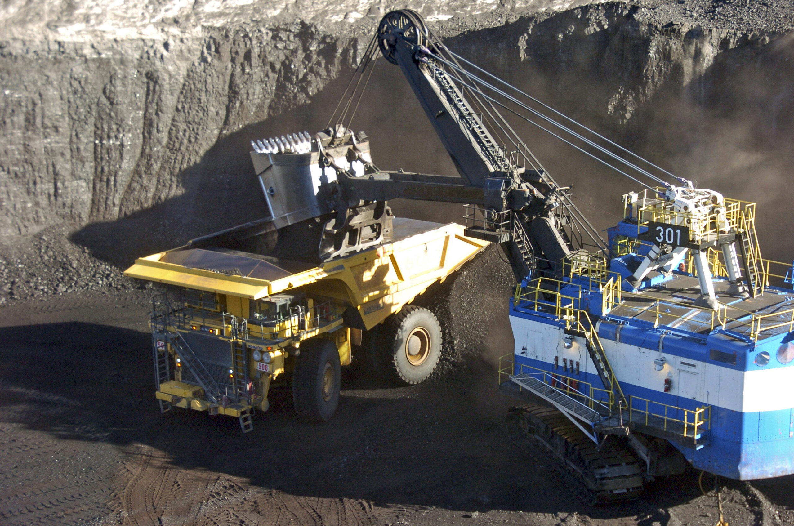 FILE - In this Nov. 15, 2016 file photo, a mechanized shovel loads coal from an 80-feet thick seam into a haul truck at Cloud Peak Energy's Spring Creek mine near Decker, Mont.  (AP Photo/Matthew Brown, File) (AP)